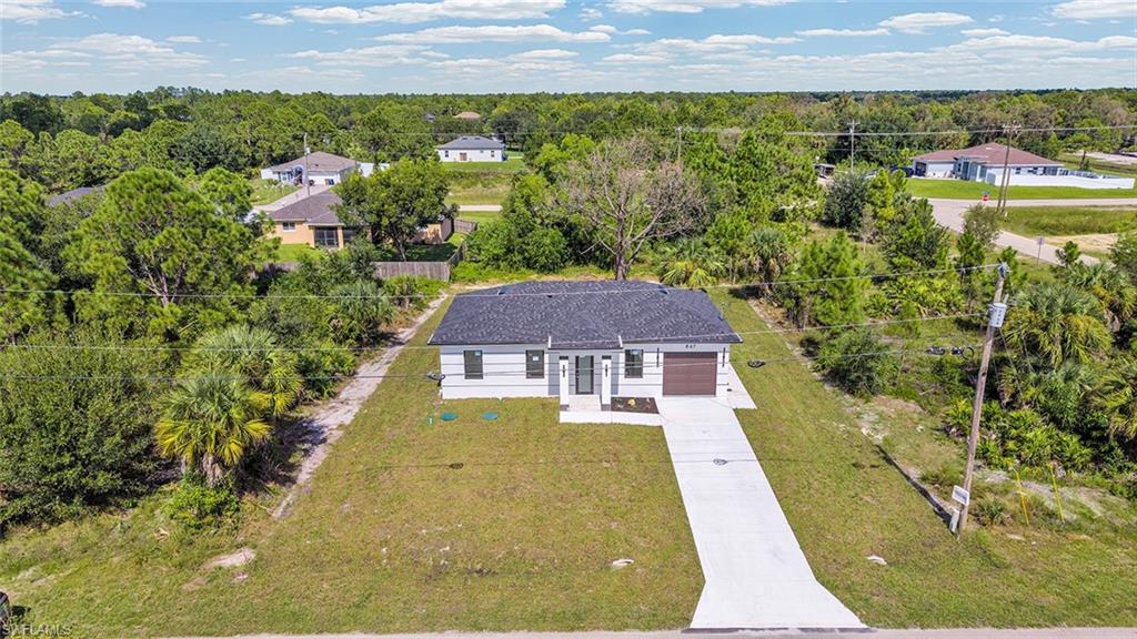 BRAND-NEW CONSTRUCTION | 3 BEDROOMS | 3 FULL BATHROOMS | MODERN FINISHES!
Welcome to this beautiful brand-new construction home in Lehigh Acres! Featuring 3 bedrooms and 3 full bathrooms, this thoughtfully designed property combines modern style, comfort, and functionality. Enjoy quartz countertops throughout, tile flooring throughout the entire home, and impact-resistant windows and doors for added protection and peace of mind. Each of the three bathrooms features a modern shower, offering convenience and privacy for family members and guests alike. With its fresh finishes, contemporary appeal, and move-in-ready feel, this home is an excellent opportunity for first time homebuyers, growing families, or anyone looking to enjoy the benefits of new construction. Conveniently located near shopping, dining, schools, and major roadways, this home offers a wonderful opportunity to enjoy the Southwest Florida lifestyle. Don't miss your chance to own this stunning new home schedule your private showing today!