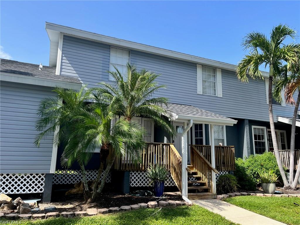 Priced to Sell! Must See! Unit remained high and dry no flooding inside the home. Stunning condo in a prime location with access to the Gulf! The community amenities make living here an absolute dream for boaters and outdoor enthusiasts alike. With a community dock, boat ramp, and onsite boat storage, community pool, you'll have easy access to all the water activities you love. Brand new front entry and stairs. Granite countertops and laminate flooring are stylish and durable, making this condo both beautiful and practical. The private lanai with a view of the peaceful green space is the perfect spot for enjoying your morning coffee or relaxing after a long day. Upstairs, the Jack and Jill style bathroom offers privacy for both bedrooms. The addition of vanities on either side ensures that each bedroom has its own space and functionality. New lighted carports have been added to the parking lot, giving each unit its own designated spot. And with the new A/C in 2022, you'll have peace of mind knowing your home is comfortably cool during those hot summer months. This is a beautiful and well-maintained condo in an incredible location that has everything you need for enjoying the Florida lifestyle. Boat storage available in complex, and boat launch that takes you out to the gulf. Motivated seller so schedule an appointment today to see it for yourself.