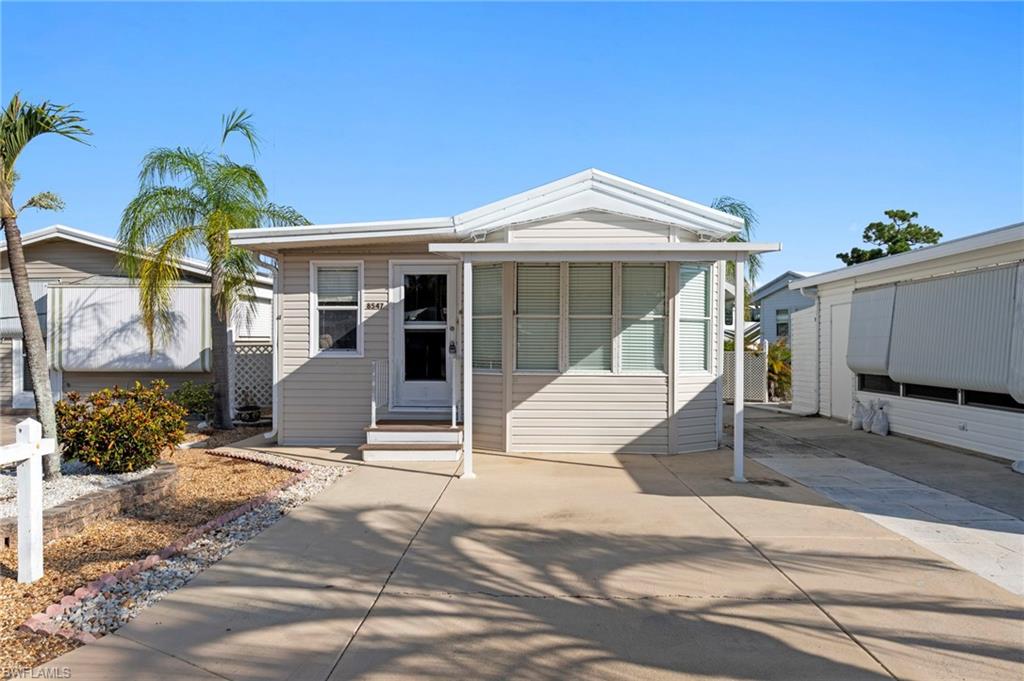 Welcome to 8547 Firwood Drive in Cypress Bend RV Resort! This inviting home features a bright, open-concept layout designed for comfortable living and easy entertaining. The spacious living area flows seamlessly into the kitchen and dining spaces, creating a welcoming atmosphere with plenty of natural light. Enjoy the convenience of  living in a desirable Southwest Florida location, close to shopping, dining, golf, entertainment, and beautiful Gulf Coast beaches. Southwest Florida International Airport (RSW) is also conveniently located nearby, making travel in and out of the area a breeze. Whether you're looking for a seasonal getaway, vacation home, or year-round residence, this property offers a wonderful opportunity to enjoy the relaxed Florida lifestyle.