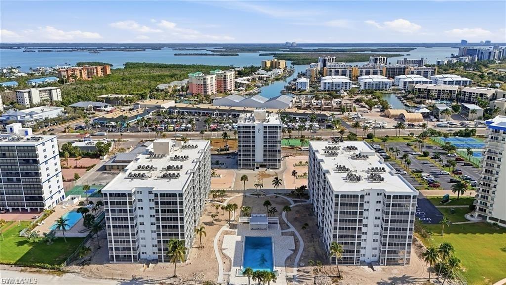 Experience the ultimate in beachfront living from this stunning 8th-floor residence in the highly sought-after Creciente North. This beautifully appointed 2-bedroom, 1-bath condominium showcases sweeping, unobstructed Gulf views from the living room, guest bedroom, and primary suite—offering front-row seats to spectacular sunsets and endless turquoise waters. Surrounded by lush, manicured grounds, Creciente delivers a true resort-style lifestyle with a large Gulf-front pool, expansive sun deck, BBQ and entertaining areas, library, fitness center, and abundant private storage. Inside, the residence is thoughtfully updated with elegant kitchen countertops, stylish vanities, modern appliances, designer flooring, and an in-unit washer and dryer—blending comfort, convenience, and sophistication. Offered turnkey furnished, this move-in-ready coastal retreat is perfectly suited for immediate enjoyment, seasonal escapes, or investment opportunities. Pet-friendly for one companion, this home welcomes both you and your furry friend to paradise. Step outside and onto seven miles of pristine white-sand beach stretching the entire length of Estero Island—your personal playground for morning walks, shelling, and sunset strolls. Just across the street, enjoy effortless access to a vibrant plaza featuring waterfront dining, fine restaurants, boutique shopping, marina services, pharmacy, post office, and more—bringing everyday convenience to your doorstep. This is more than a condo—it’s a front-row ticket to the Southwest Florida lifestyle you’ve been dreaming of.