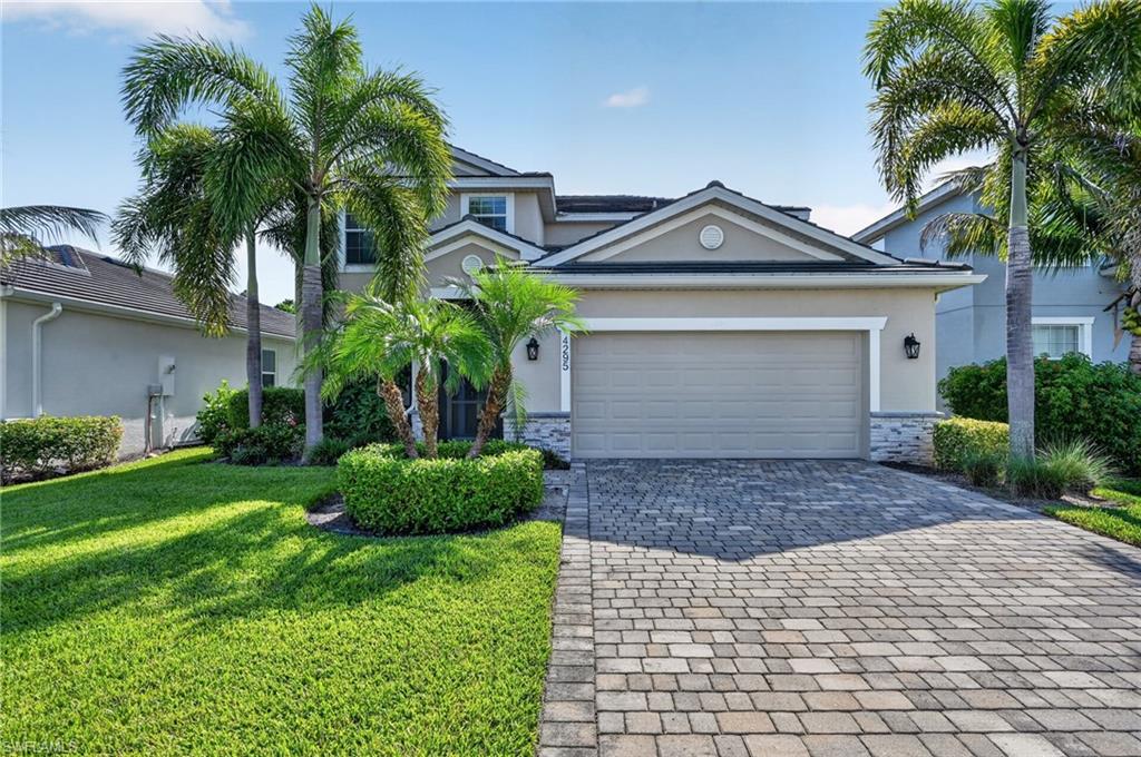 Welcome to 4295 Bluegrass Drive, a beautifully appointed Fort Myers home located within a desirable gated community of Castalina. Thoughtfully upgraded and designed for both comfortable everyday living and entertaining, this home offers an exceptional combination of indoor and outdoor features. At the heart of the home is the spacious kitchen, offering abundant cabinetry and countertop space along with an impressive center island that provides plenty of room for meal preparation, casual dining, and gathering with family and friends. The generous layout makes the kitchen a natural centerpiece of the home and an ideal space for entertaining. Upstairs, updated waterproof luxury vinyl flooring provides a stylish, durable, and low-maintenance finish. Thoughtful upgrades include California Closet systems for enhanced organization and storage, while the guest room features a convenient Murphy bed, allowing the space to easily transition between a comfortable guest retreat and flexible everyday living area. Step outside to your own private Florida retreat, featuring a freeform pool and spa with waterslide, all enclosed within a screened cage for year-round enjoyment. The outdoor kitchen makes poolside dining and entertaining effortless, creating the perfect setting for gatherings or simply relaxing at home. The screened front entry, a custom addition not offered as a standard builder option, adds another comfortable outdoor space while allowing fresh air to flow through the home. The home also features a premium Lennox PureAir whole-home air purification system with MERV 16 filtration and ultraviolet (UV) light technology, providing enhanced air filtration throughout the home. A brand-new water heater adds additional peace of mind. Beyond the home, residents enjoy the privacy of a gated entrance along with an impressive selection of community amenities, including a clubhouse, resort-style community pool, fitness center, and additional recreational opportunities. 4295 Bluegrass Drive delivers the Florida lifestyle both inside and out. Schedule your private showing and experience everything this exceptional home has to offer.