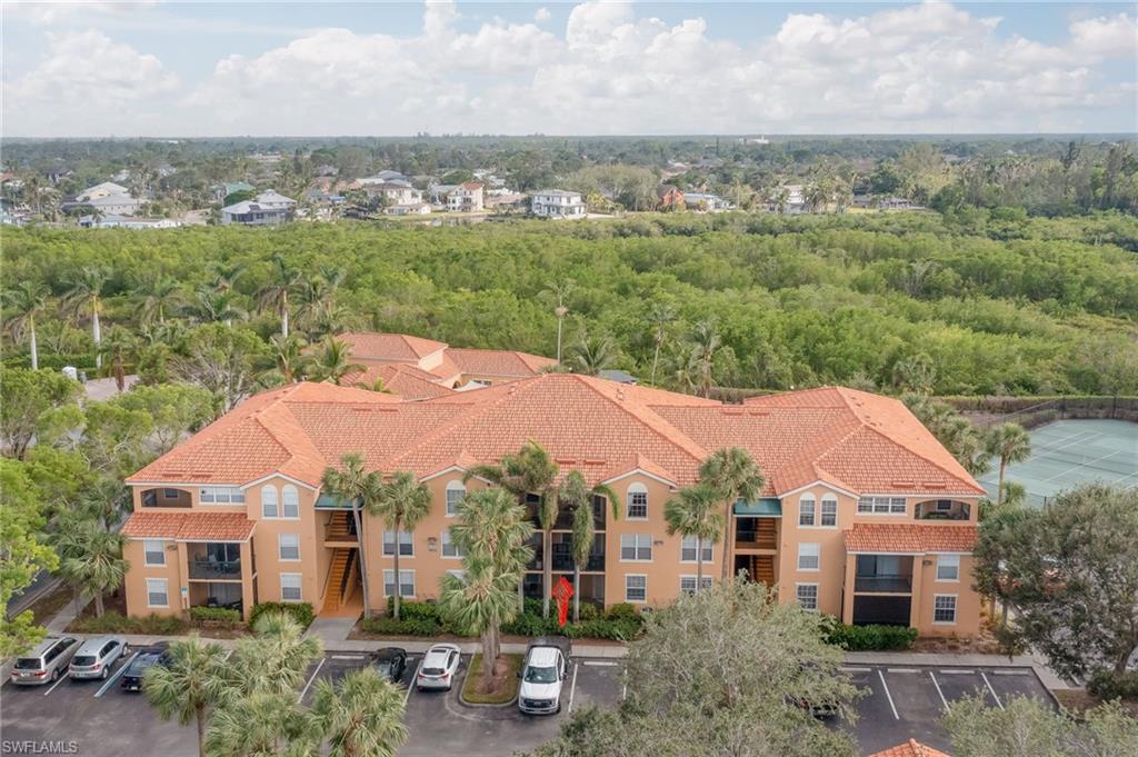 ENJOY THE FLORIDA LIFESTYLE IN THIS SPECTACULAR, COASTAL FLAIR, (2) BEDROOMS, (2) BATH CONDO LOCATED ON THE SECOND FLOOR!  (1) CAR GARAGE INCLUDED!  BEAUTIFUL LUXURY VINYL FLOORING!  CROWN MOLDING!  NEWER STAINLESS STEEL APPLIANCES, WINDOW COVERINGS, LIGHTING FIXTURES, A/C SYSTEM NEW (2021), VANITIES IN BOTH BATHROOMS, AND INTERIOR PAINT TO NAME A FEW!  GREAT ROOM CONCEPT WITH DINING COMBINATION!  SPACIOUS OWNER'S SUITE WITH WALK-IN CLOSET!  FRENCH DOOR TO SCREENED LANAI!  THIS UNIT SHOWS EXCEPTIONALLY WELL AND IS CENTRALLY LOCATED JUST NORTH OF BONITA BEACH ROAD AND WITHIN CLOSE PROXIMITY OF THE SOUTHWEST FLORIDA BEACHES!    THIS CONDO DID NOT SUSTAIN ANY HURRICANE IAN DAMAGE !