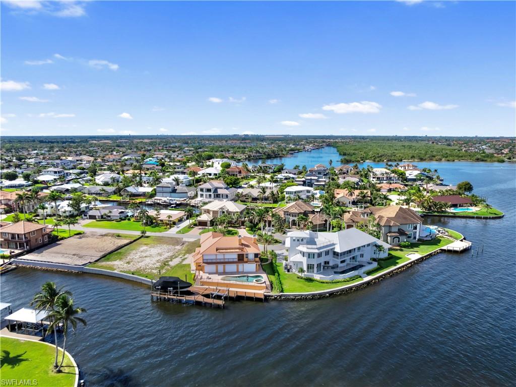 TOWN AND RIVER - Land