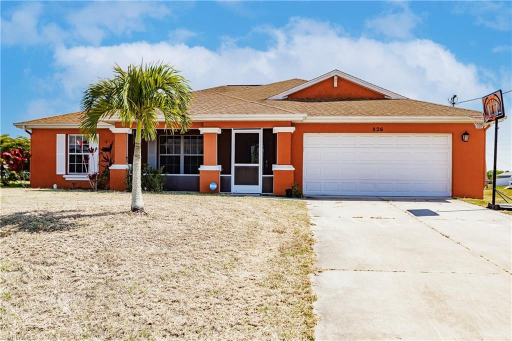 This 3 bedroom, 2 and a half bath totally solar powered home located in the growing community of Cape Coral offers open floor plan with both living and dining, bonus room, spacious kitchen, and provides lots of flexibility in arranging your living space. With over 1800 square feet of living space this home features soaring vaulted ceilings, plant shelves, recessed lighting, blinds throughout, and color accent walls. Bonus room could be home office or 4th bedroom. Kitchen boasts warm wood cabinetry, under cabinet lighting, smooth counters and tiled back splash, pantry, and breakfast bar that opens to the main living area for easy entertaining. Master suite has beautiful wood plank laminate flooring, walk in closet, and private en suite bath with his and hers sinks, wood cabinetry, soaking tub, and shower. Other features include impact resistant windows and sliders, fenced back yard, and dedicated laundry room with front load washer & dryer. Welcoming curb appeal with screened front porch with etched glass double door entry.