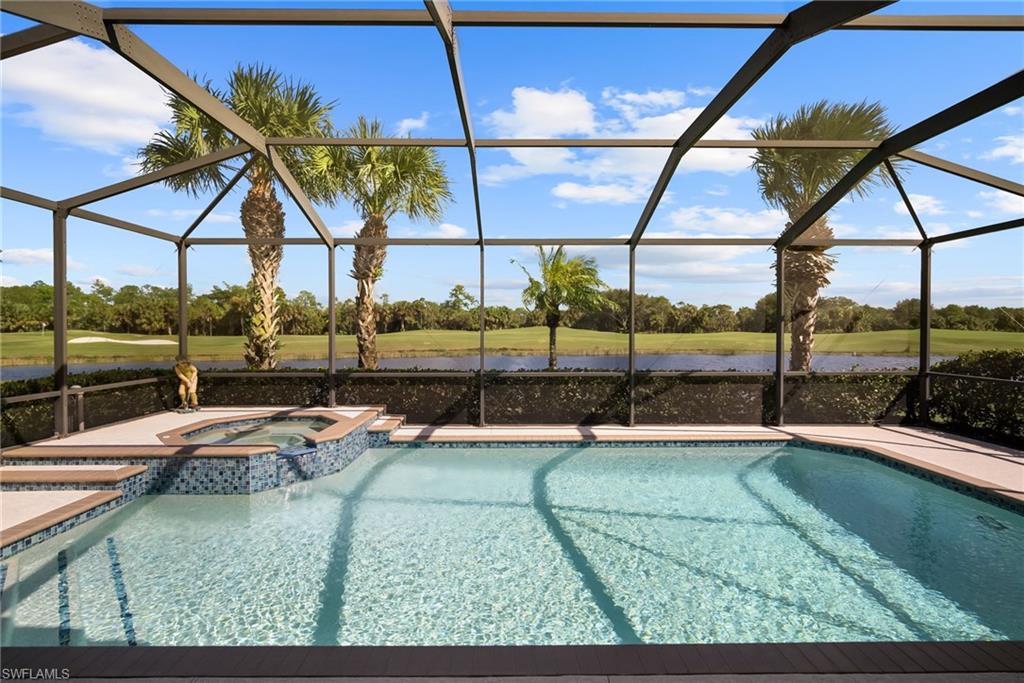 You will LOVE the beautiful morning sunrise view of the #3 green, water, and preserve in this absolutely IMMACULATE, one-owner "Foxhall" model with recently updated pool! The "Foxhall" is the most popular single family home floorplan in Heritage Bay, for good reason, with an open kitchen and 4 full bedrooms (one with French doors used as an office). This lot is especially UNIQUE as you will also enjoy a great view of the entire #6 par three from your front driveway. Also, your FULL golf membership is INCLUDED with purchase! This house includes impact sliders and windows for peace of mind, plantation shutters on every window, newer Quartz countertops, and all appliances, A/C, & water heater are newer as well! Brand NEW fridge & dishwasher! Heritage Bay features a stunning 27-hole Lewis-Azinger designed golf course and aqua driving range. The grand clubhouse offers diverse dining options, elegant event spaces, and a lively social scene. Have a bite to eat in The Grille Room— a casual indoor/outdoor bar & dining area, with an incredible southern view of the 27th green. Members can also enjoy a resort-style pool area with heated spa & 'The Cabana' poolside bar & grille with a full service kitchen. Heritage Bay also includes a top-notch tennis program with 7 har-tru clay courts, pickleball & bocce courts, and a state-of-the-art fitness center. With a calendar full of events and activities, Heritage Bay ensures a vibrant and luxurious lifestyle for its members. Whether you're a golf enthusiast or simply looking for serene views and luxury living, Heritage Bay offers it all. 2019 special assessment for amenities renovations paid in FULL