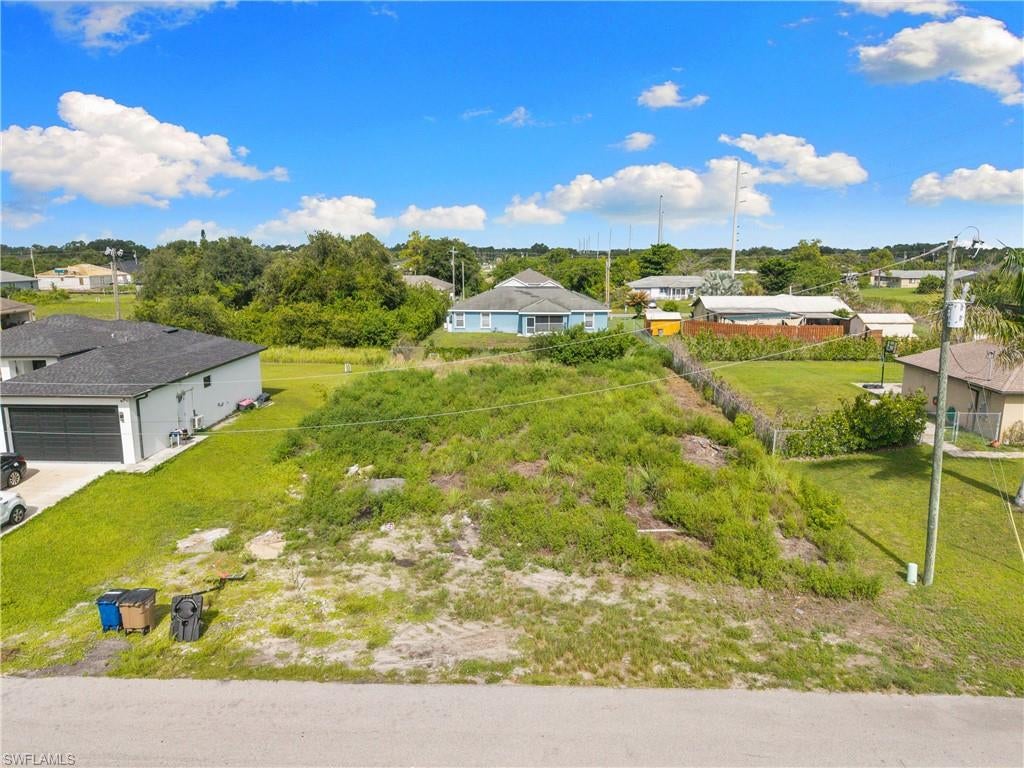 LOT WITH PERMITS READY TO BUILD in 33976 zip code. Save months of time and hassle and build now. Lot is elevated and easy to access, close to schools, shoppings. Great investment or owner-build opportunity. Approved plans available upon request.