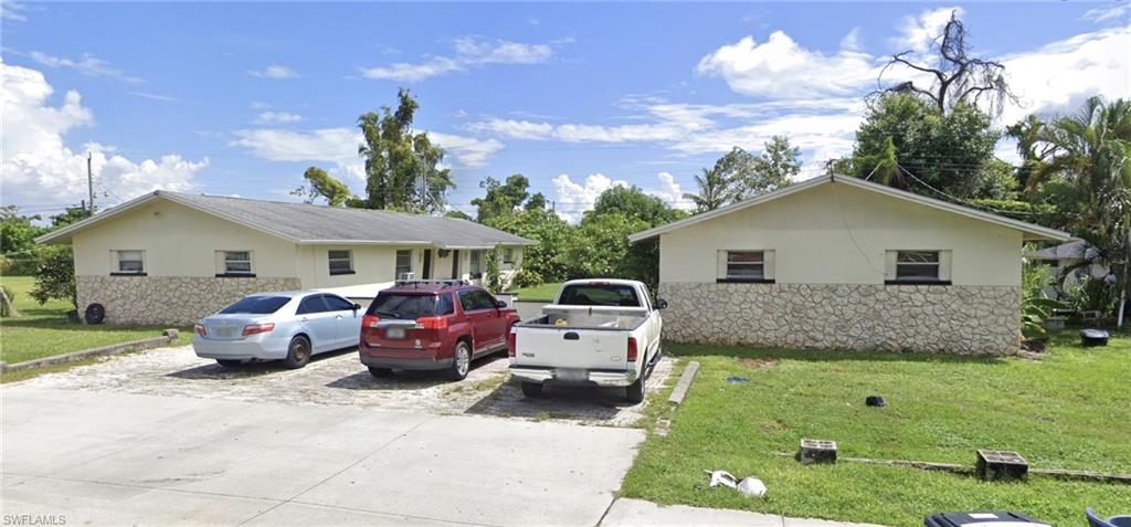 Four-unit income property at 5519-5525 Seventh Ave in Pine Manor, central Fort Myers. Four 2-bedroom/1-bath units, all leased, bringing in $4,645/month ($55,740/year) in gross rent. Unit 5519 was recently remodeled with new white shaker kitchen cabinets, large-format porcelain tile throughout, an updated bath and fresh paint. Concrete block construction, one parcel, central water and sewer, and tenants pay their own water and electric. A turnkey investment close to shopping, dining and major roads. Seller is a licensed Florida real estate broker.