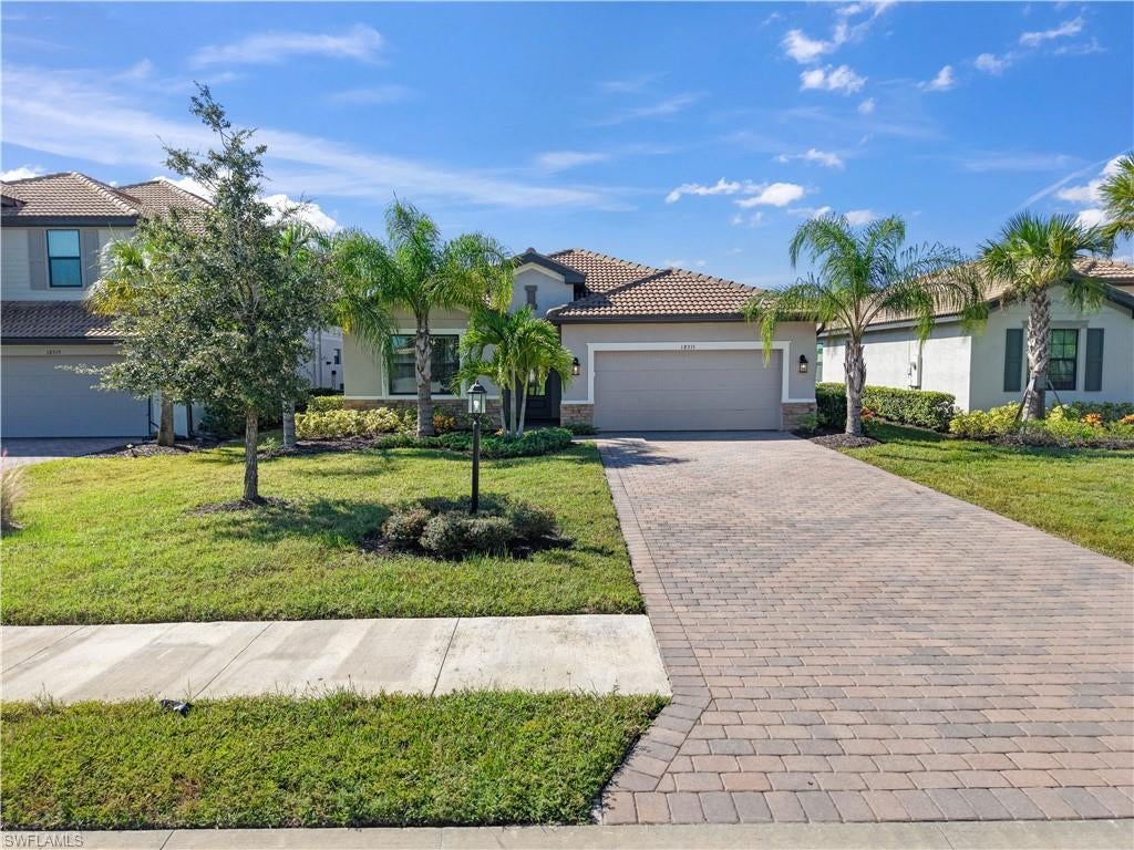 Welcome to the highly sought-after Marsala floor plan by Lennar! This meticulously designed 3-bedroom plus den, 3-bathroom executive home offers 2,201 sq ft of pristine, single-story living space perfectly blending luxury and functionality. The heart of the home is a wide-open great room and dining area that flows seamlessly into the gourmet kitchen, featuring a massive central island, quartz countertops, and stainless-steel appliances. Enjoy ultimate privacy with a smart split-bedroom layout. The private primary suite boasts dual walk-in closets and a spa-like en-suite bath. Each secondary bedroom has immediate access to its own bathroom, creating a true triple en-suite experience. The versatile den makes a perfect home office. Complete with an attached 2-car garage and room for a pool, this home defines modern Florida living! VERDANA VILLAGE RESORT-STYLE LIVING AT ITS FINEST! Verdana Village offers premier, world-class amenities unmatched in Southwest Florida. The spectacular community campus features a massive indoor sports complex with 4 indoor pickleball courts, 2 indoor tennis courts, and a full-size basketball court. Outdoor enthusiasts will love the 12 additional pickleball courts, 6 tennis courts, bocce, and multiple sports fields. Relax at the oversized resort-style pool complete with private cabanas, a zero-entry lounge area, waterfalls, a large spa, and a dedicated yoga lawn. Enjoy community-exclusive dining at the full-service restaurant, grab a drink at the poolside Craft Lounge, or stop by the Café for smoothies and ice cream. Additional highlights include a state-of-the-art fitness center, movement studio, a secondary West Amenity Center with its own lap pool, a dog park, a children's playground, and an active social calendar managed by a full-time lifestyle director. Golf-cart friendly with direct path access to the brand-new Publix shopping center right outside the gates!