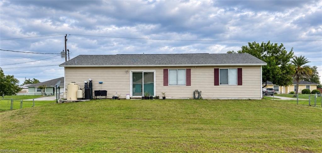 Welcome to this 3-bedroom, 2-bathroom single-family home featuring an extra-large bonus room and 1,248 square feet of living area on an approximately 0.29-acre lot in Lehigh Acres. The functional split-bedroom floor plan offers comfortable living and dining areas, along with an eat-in kitchen. The oversized bonus room provides valuable additional interior space with flexibility for a home office, media room, hobby area, or other personal needs. Tile and vinyl flooring, central air conditioning, and a fenced backyard add to the home's features. The roof was replaced in 2017. No HOA. Conveniently located near shopping, dining, schools, and major roadways. Schedule your showing today to explore all this property has to offer.