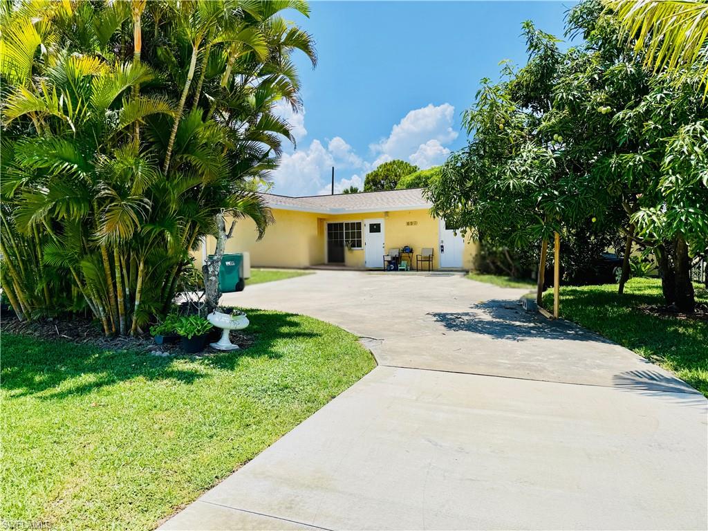 Water, lawn care and trash collection are included for $100/mo.
Beachy vibes and updates galore! This 2 bedroom 2 bath duplex apartment has been completely remodeled; featuring a new kitchen, appliances, new bathrooms, flooring, windows and a private fenced backyard lined with mature trees and tropical plants.  Enjoy everything North Naples offers from this sought after west of 41 location; just minutes from dinning, shopping, golf, beaches and more.
