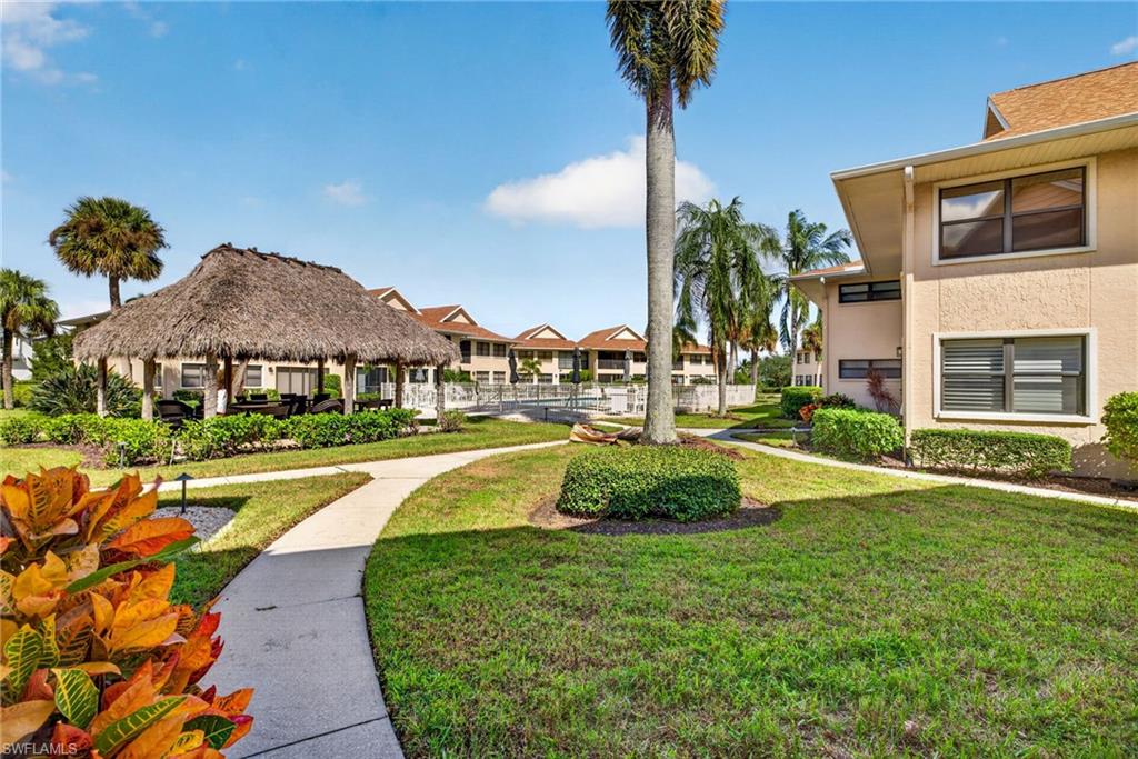 Discover the Best of Olde Naples Living at Bayside Villas!

Enjoy the charm and convenience of Olde Naples in this spacious two-bedroom, two-bath end-unit condominium, ideally situated in the heart of it all. Located directly across from Naples Bay, Naples Landing Park with public boat ramp access, Crayton Cove, and the City Dock, you’ll be surrounded by waterfront attractions, wonderful restaurants, and art galleries.

Just a short stroll away, you’ll find Cambier Park and the vibrant shops and dining of Fifth Avenue South. The beautiful beaches of Naples, along with the popular restaurants and boutiques of Third Street South, are less than a mile away.

This inviting first-floor residence offers a comfortable and versatile layout, including a separate den and an enclosed lanai with sliding glass doors and screens that expands your living space. Both bathrooms have been tastefully renovated, adding to the appeal of this well-located home. A deeded carport is also included for your convenience.

Whether you’re looking for a full-time residence, a seasonal getaway, or an opportunity to enjoy the relaxed coastal lifestyle, this delightful condominium at Bayside Villas offers an exceptional opportunity to experience all that Olde Naples has to offer!
