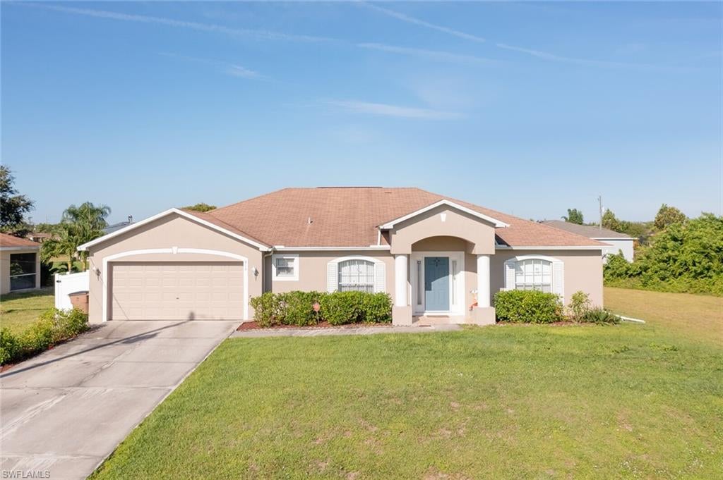 This Immaculate 3 Bedroom 2 Bath home with a den , which can be used as a 4th bedroom,  close to 1-75 , easy commute to Fort Myers, and shopping , tile floors, ceiling fans , New AC unit, New well pump 2021, all appliances to convey, nice open kitchen with view of the back yard, pantry, garage door opener and pull down ladder in garage, washer, dryer.  This home has a formal dining room, breakfast nook, Living room , split floor plans, plant shelves, privacy fence , Lanai under truss to relax and enjoy sunset,  master bathroom suite has a rounded tub and shower, to enjoy, walk -in-closet in MB, Lovely landscaping, This home will not last on the market!! Call today for your private showing.