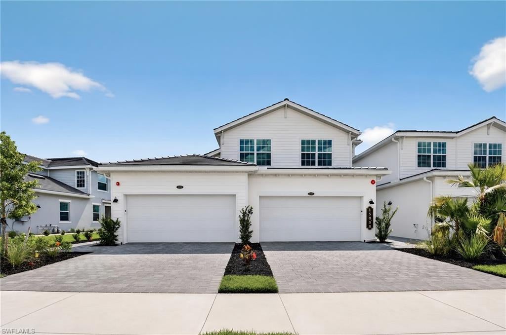 MOVE-IN READY!! This spacious 1,741-square-foot two-story home features a convenient two-car garage on the lower level and an open-concept main floor that seamlessly connects the gourmet kitchen, dining area, and great room. The kitchen shines with GE® stainless steel appliances, quartz countertops, a large island, ceramic tile backsplash, under-cabinet lighting, and a walk-in pantry—perfect for both everyday living and entertaining. Nine-foot ceilings and luxury vinyl plank flooring enhance the airy feel, while energy-efficient LED lighting and smart home features like a Nest thermostat add modern convenience. Upstairs, the owner’s suite offers private lanai access and two walk-in closets, accompanied by a primary bath with dual sinks, a soaking tub, and a glass-enclosed shower. Two additional bedrooms are thoughtfully positioned at the front of the home. Located at Webbs Reserve, residents enjoy access to sparkling pools, premium resort amenities, and a golfer’s paradise just a golf cart ride away. Homes like this don’t stay available for long—act now to make it yours!

Prices, dimensions and features may vary and are subject to change. Photos are for illustrative purposes only.