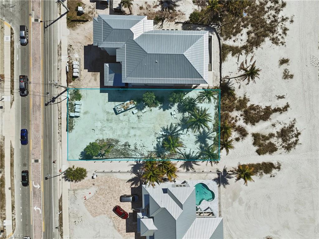 RARELY AVAILABLE — GULF-FRONT OPPORTUNITY ON FORT MYERS BEACH

Imagine owning your very own piece of paradise where sugar-white sand, turquoise Gulf waters, and spectacular sunsets become part of your everyday life. This exceptional Gulf-front parcel offers a truly rare opportunity to create a custom coastal residence on one of Southwest Florida’s most sought-after shorelines.

Ideally positioned mid-island on Fort Myers Beach, this FULL LOT homesite places you directly along the Gulf, where endless views and the soothing rhythm of the waves provide the ultimate backdrop for relaxed coastal living. Picture morning coffee with the Gulf breeze, afternoons spent barefoot on the beach, and unforgettable evenings watching the sun melt into the horizon—all just steps from your future front door.

Beyond the incredible beachfront setting, the location offers the perfect balance of tranquility and convenience. Enjoy an easy walk to the iconic Margaritaville Resort, Times Square, restaurants, shops, entertainment, and the vibrant island lifestyle that makes Fort Myers Beach such a beloved destination.

With Gulf-front building opportunities becoming increasingly scarce, this property offers something truly special: a blank canvas to create the coastal retreat you’ve always envisioned. Whether your dream is a luxurious primary residence, a private vacation escape, or an exceptional investment opportunity, this is your chance to build something uniquely yours on the Gulf.

The land is here. The Gulf is waiting. Your dream home can be next.

Don’t miss this extraordinary opportunity to secure your own slice of Fort Myers Beach and create a legacy property where the best of coastal living is right outside your door.