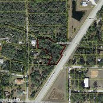 Great location in growing area of LaBelle. Walmart and Tractor Supply to west approximately 1 mile. Mini Brewery  to east. Also close by are Hendry County court house and SR 29 south to Alligator Alley and north to SR 27. SR 80 provides easy travel to Fort Myers to west and West Palm Beach and Miami to east, south to Immokeelee and north to Moore Haven. This parcel is located on the north side of SR 80 just before the city limits with traffic flow direct east and west thru town. Great Investment in growing area.