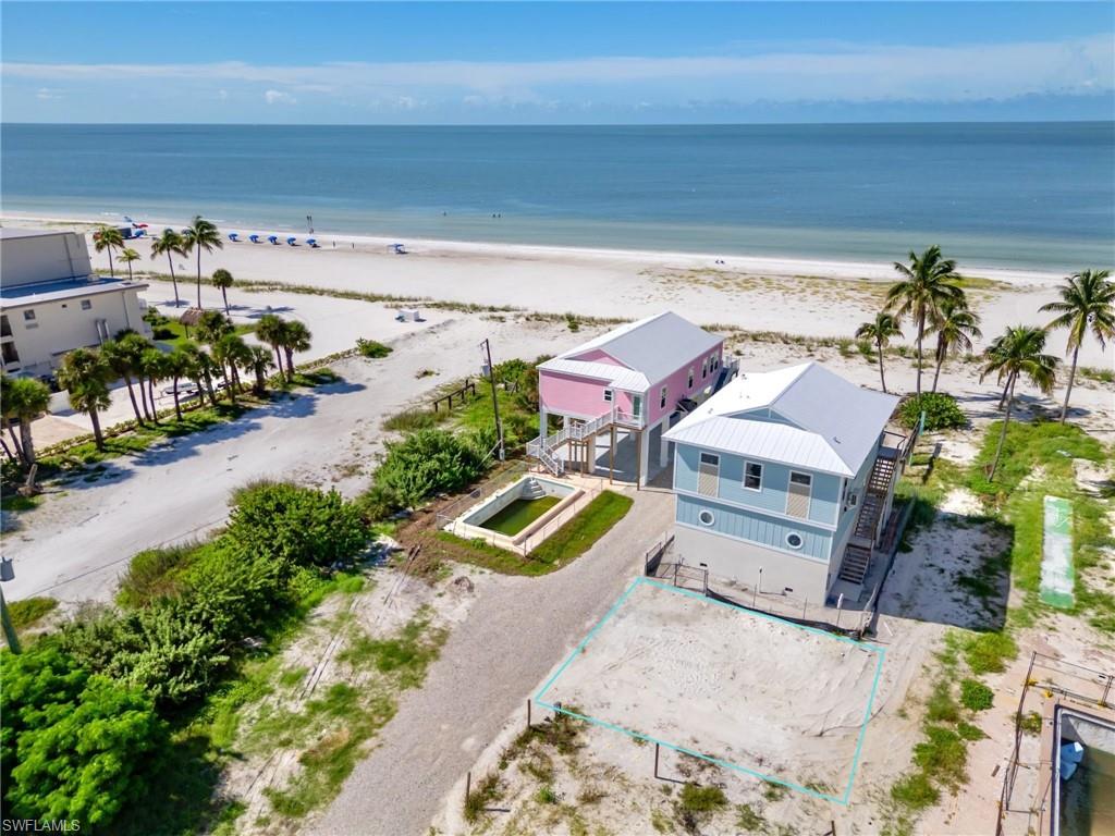 Fantastic opportunity to build your dream BEACH cottage on the GULFSIDE of Estero BLVD in a premier North End location on Fort Myers Beach with WEEKLY rentals! This prime lot offers direct beach access, stunning Gulf views, & unforgettable sunsets right outside your door. The location truly can’t be beat with everything you need to enjoy the best of island living just a short distance away. From Times Square, The Pier, Margaritaville, Pink Shell, to Downtown, you're just steps from vibrant waterfront dining, live music, bars, boutiques, farmers markets & so much more. With the surrounding area currently being transformed with major upgrades underway at Lynn Hall Park, Bowditch Point Regional Park, Brick & mortar coming to Times Square plus the new Pier being constructed these opportunities won't be here forever! Positioned perfectly for easy access on and off the island, this location helps you avoid most of the traffic and makes venturing inland a breeze. The 50x60ft Gulfside lot is a blank canvas ready for your vision whether you're building your ideal beach getaway, a seasonal retreat, or a high-demand investment property this is where you want to be. Approved plans, renderings, survey, and MUD are available upon request. Don’t miss this awesome opportunity to be part of the renaissance and revitalization of Fort Myers Beach & start living the Southwest Florida lifestyle today! Call Today!
