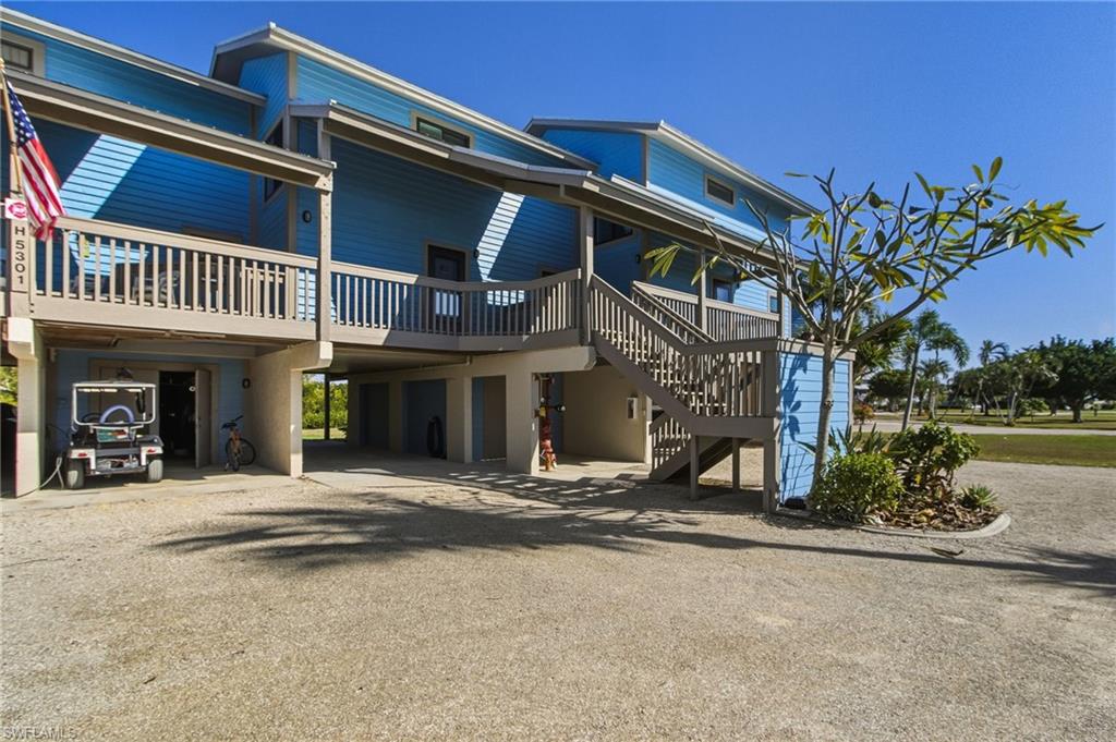 This is one of Pine Islands most unique, well-maintained, sought after developments. As you drive up and over the bridge into Blue Crab Key, the peaceful, close-knit feel of this tropical island community is immediately apparent. Enjoy quiet evenings relaxing on your lanai or front deck.  Spend time socializing at one of the two pools areas with whirlpool spas, or the pickleball courts.

This unit for sale offers a gorgeous view overlooking the mangroves and canal.  With Matlacha Pass in the background you’re just minutes from some of the best fishing in the world as you head out to Charlotte Harbor.

The lanai is fully glassed in for comfortable air-conditioning year-round.  The high-impact windows and doors are a wonderful bonus.  Inside you have two spacious bedrooms, with en-suite bathrooms, and an open floor plan. Another standout feature is the extended storage unit on the first level, perfect for kayaks, fishing poles, bikes, boat equipment, and more, with all shelving included.  

The excellent amenities include two pools, two whirlpools, pickleball as well as tennis courts, and a putting green, clubhouse and an observation deck.  Boaters have everything you need with boat and kayak storage, a community boat ramp, and docks available on a first-come, first-serve basis.

With the canal and docks right outside the back door you can easily view your boat and enjoy access for loading, unloading, and rinsing after a day on the water. To top it all off, the HOA fees are the lowest on the island! Blue Crab Key is centrally located to make it much faster and easier to get on and off island. This home is being sold furnished, making it truly move-in ready.