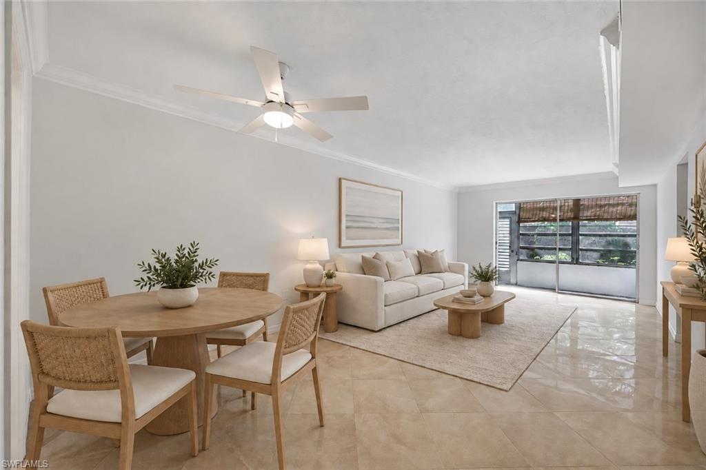 One or more photo(s) has been virtually staged, AI generated or rendered.  Leave the car parked and make Olde Naples your neighborhood. Walk to the Gulf for sunset, explore the restaurants and boutiques of Fifth Avenue South, or spend a leisurely afternoon beside the heated community pool. At Park Terrace Club, this refreshed 1-bedroom, 1-bath residence offers exceptional value in a coveted downtown setting, with the convenience of ground-floor living. Inside, fresh paint, crown molding, and large polished porcelain tile bring a bright, cohesive feel to more than 700 square feet of living space. The living and dining area opens to a private lanai framed by greenery, an inviting spot for morning coffee or a quiet evening with a book. White cabinetry, granite countertops, and stainless steel appliances give the galley kitchen a timeless look, complemented by under-cabinet lighting and ample storage. The spacious bedroom features a generous walk-in closet with built-in shelving and hanging space. A glass-enclosed tiled shower, vanity, and medicine cabinet complete the bathroom. One of this residence’s standout features is its assigned parking space immediately beside the condo, with direct access through the lanai’s exterior door and guest parking nearby. A separate kitchen entrance simplifies grocery trips, while the main entry opens to a foyer with an additional closet. The pool is close at hand, and a common elevator serves the second-floor laundry facilities and dedicated storage locker. Beyond the property, the Naples Regional Library adds another neighborhood destination, with downtown galleries, cafés, and shopping within easy reach. Whether you are seeking a year-round home, a winter getaway, or a potential seasonal rental investment, Unit 106 offers an appealing opportunity to enjoy the everyday pleasures of Olde Naples.