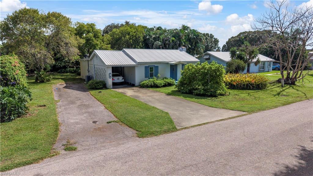 Welcome to 426 W Crescent Drive, located in the heart of Clewiston! This 2-bedroom, 2-bathroom single-family home offers 1,258 square feet of living space on a spacious 0.27-acre lot. The property features a metal roof, central A/C, an attached carport, and a covered front porch. Built in 1945, this home offers character and plenty of potential for buyers looking to add their personal touch. Whether you’re searching for your next home or an investment opportunity, this property offers possibilities to make it your own. Property is being sold AS-IS. Don’t miss this opportunity. Schedule your private showing today!