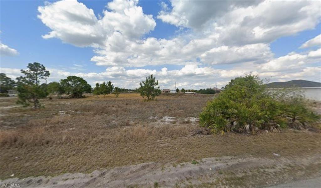 Discover this 0.25-acre vacant residential lot in Lehigh Acres, FL, offering a great opportunity to build a new home in a growing Southwest Florida community. The property is located on a paved road with power available, providing convenient access for future development. Situated in a residential area of Lehigh Acres, the lot is surrounded by established and developing homes, with convenient access to major roads, shopping, restaurants, schools, parks, and everyday amenities. Enjoy the combination of a spacious quarter-acre homesite and a location that offers access to everything Lehigh Acres and the surrounding Fort Myers area have to offer. Whether you're looking to build your future home or add to your investment portfolio, this property offers flexibility and potential in a desirable Southwest Florida location.