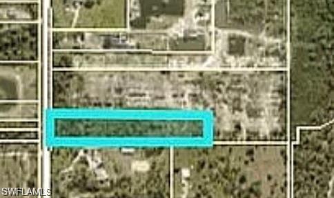 Discover this incredible 3-acre lot, perfect for building your dream farm home in a serene and natural setting. This property is equipped with essential utilities, including city water and electricity, ready for your plans.

Conveniently located near I-75, the airport, and downtown Fort Myers, this land offers the perfect blend of tranquility and accessibility. Don’t miss out on this unique opportunity!