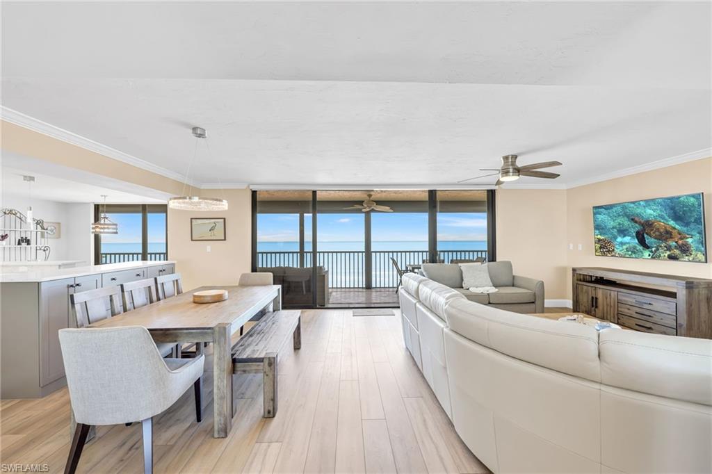 RARELY AVAILABLE… GORGEOUS, TURNKEY, FULLY RENOVATED BEACHFRONT 2 bedroom, 2 1/2-bath condo for lease at CASA GRANDE on Vanderbilt Beach. This condo has been fabulously redesigned to accommodate up to six people. This meticulously maintained home showcases incredible features including: Remote sun shade window coverings, plantation shutters, crown molding, beautiful wood flooring, custom built cabinets, mounted TVs, high baseboards, electric hurricane shutters, and direct beach views. The open-concept living area flows to a large tiled screened lanai and balcony overlooking the Beach and Gulf. The primary suite features a king bed, and the guest room offers a queen size. There’s even a pullout sofa for extra guests. Spa-style baths boast tiled showers to the ceiling, dual sinks, and high-profile vanities with quartz tops, and an extra half bath for your guests. The standout kitchen includes stainless steel appliances, quartz countertops, a separate island, soft-close drawers and doors, a deep stainless sink, gorgeous blue backsplash, pendant lighting, and abundant storage. Convenience continues with a high-end washer and dryer set and a laundry tub and plenty of guest parking across the street. Community amenities include an elevator, private beach access, a large heated pool, and storage area. Only minutes away from world-class dining, shops, and entertainment.