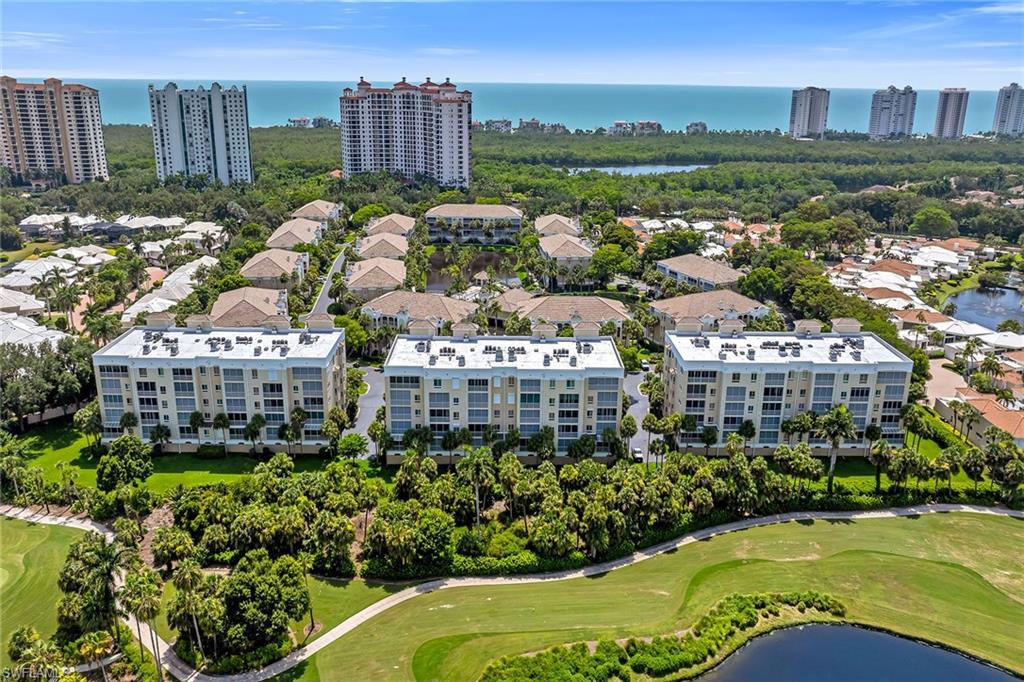 Beautifully updated throughout, this inviting first-floor residence offers effortless Naples living with stylish finishes, an open layout and a seamless connection to outdoor spaces. Ideally situated directly across the street from the Pelican Bay Beach tram stop, you'll enjoy convenient access to Pelican Bay's private beaches and exceptional coastal amenities. Featuring three bedrooms, two baths and a detached one-car garage, this move-in-ready home is offered furnished with exclusions and combines modern finishes with everyday comfort. A screened lanai with electric shutters, ceiling fans and a built-in outdoor grill creates the perfect setting for relaxing or entertaining year-round. Inside, tile flooring flows throughout the home, complemented by plantation shutters that enhance every room with timeless style and privacy. The spacious living and dining areas are filled with natural light and open through large sliding glass doors to the screened lanai, creating a bright and inviting atmosphere for both everyday living and entertaining. The kitchen is designed to impress with crisp white cabinetry, stainless steel appliances, including a dishwasher, microwave, refrigerator with freezer and icemaker and range, offering both beauty and functionality for the home chef. The private primary suite serves as a peaceful retreat with direct access to the lanai, abundant natural light, plantation shutters, a ceiling fan and a generous walk-in closet. The spacious en-suite bath features dual sinks, a walk-in glass shower with bench seating and an enclosed water closet for added privacy. The guest accommodations are thoughtfully designed for flexibility. One guest bedroom includes a ceiling fan, ample closet space and access to a full bath featuring a glass shower/tub combination, making it ideal for guests. The third bedroom offers generous closet space and can easily be transformed into a den, home office or flex space to suit your lifestyle. Additional conveniences include a laundry area equipped with an LG washer and dryer, providing added functionality for everyday living. Residents of Pebble Creek enjoy an impressive collection of amenities on the community's amenity island, including two pools and a hot tub, a fitness center, a sauna, a grilling area, a dining gazebo and a party room, providing additional opportunities for relaxation and social gatherings. Combined with desirable indoor-outdoor living spaces and proximity to Naples' renowned shopping, dining and entertainment, this exceptional residence offers an outstanding opportunity to enjoy the Southwest Florida lifestyle.