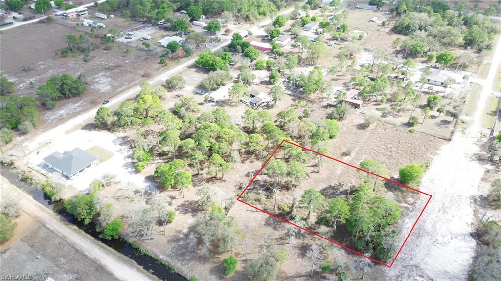 1.25 ac available for sale in Montura Ranches located off Bald Cypress Ave and N Isora ST. Measuring about 165x 330, this parcel allows for Single and Double Manufactured Homes, Modular or site-built homes. This is a rural horse and golf-cart friendly growing community with NO HOA's. Residents have access to a community clubhouse and poolhouse. 1.5hr from each coast. 25 min from the city of Clewiston. Pay no city taxes. Will need septic, well and culvert. Rear parcel is also available for sale for a total of 2.5 acres, check out listing MLS:2026043011
