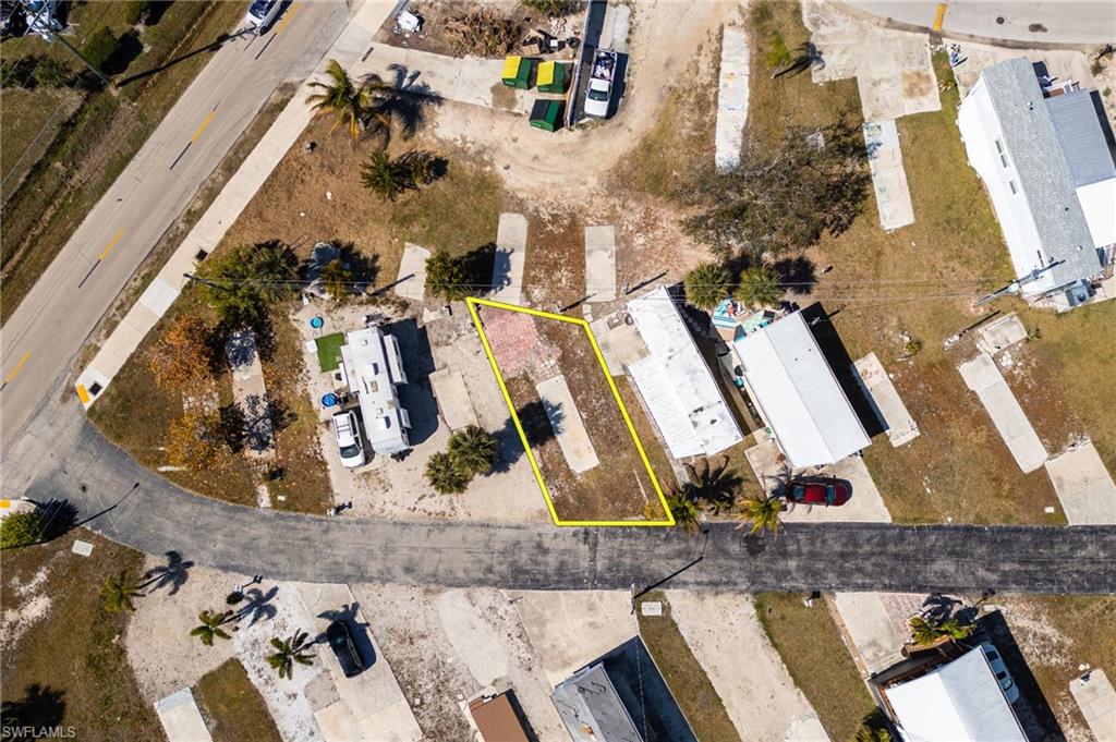 PRICED TO SELL! VACANT MANUFACTURED HOME LOT NEAR FORT MYERS BEACH - 55+ COMMUNITY, PET-FRIENDLY & GOLF CART-FRIENDLY!

Build your Southwest Florida getaway on this vacant manufactured home lot in the desirable 55+ Helen Lane Condo Community on San Carlos Island. Located just over one mile from Fort Myers Beach and Times Square, this property offers an affordable opportunity to create a seasonal retreat, winter home, or full-time Florida residence close to beaches, boating, waterfront dining, shopping, and entertainment.

Enjoy the laid-back Fort Myers Beach lifestyle with the convenience of walking, biking, or taking your golf cart to nearby restaurants, marinas, and island attractions. Popular waterfront dining including Doc Ford’s Rum Bar & Grille, Dixie Fish Co., and Parrot Key Caribbean Grill is nearby, along with Salty Sam’s Waterfront Adventures and the Key West Express.

This pet-friendly and golf cart-friendly 55+ community offers a peaceful island setting while keeping you close to everything Fort Myers Beach and San Carlos Island have to offer. Spend your days boating, fishing, relaxing on the white-sand beaches, enjoying waterfront restaurants, or exploring Southwest Florida.

Whether you are searching for a Fort Myers Beach manufactured home lot, vacant land near the beach, an affordable Florida winter retreat, or a low-maintenance homesite in a 55+ community, this property offers location, lifestyle, and flexibility.

Vacant lots near Fort Myers Beach are increasingly difficult to find, especially in established communities with convenient access to beaches, boating, dining, marinas, and entertainment.

Bring your new manufactured home plans and start creating your own piece of Southwest Florida paradise. Schedule your showing today!