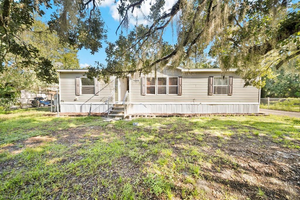 Need space for your toys, tools, or weekend projects? This one has it! Located in the peaceful River Oaks community, this well-kept 3-bedroom, 2-bath home offers 1,352 sq. ft. of living space on approximately 0.23 acres. The fully fenced yard provides added privacy, while the detached 2-car garage/workshop with concrete flooring and electric gives you plenty of room for storage, hobbies, or recreational equipment. Inside, enjoy a spacious kitchen, pantry, walk-in closet, and a comfortable, functional layout. Just minutes from the Ortona boat ramp and locks, you’ll have easy access to boating and fishing. Whether you’re looking for a full-time home or your Florida getaway, this property offers the space, functionality, and laid-back lifestyle you’ve been looking for.