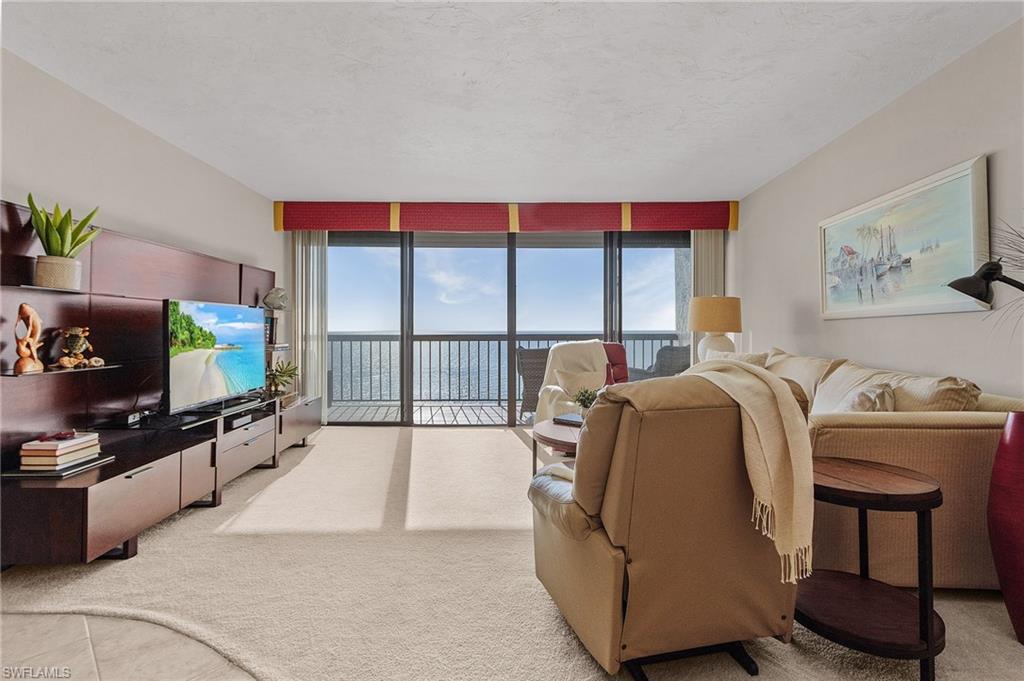 One or more photo(s) has been virtually staged, AI generated or rendered.  Now offered at $770,000, this Gulf Front 9th-floor residence at Ambassador presents an exceptional opportunity on Bonita Beach. Sweeping, unobstructed views of the Gulf and the signature sunsets of Southwest Florida fill both the living area and the primary suite, which opens directly to the balcony. Offered fully turnkey, the home is ready for immediate enjoyment this season whether as a personal retreat or as a flexible rental property. The building features secure access control, new elevators, and a new pool and spa are currently under construction, further enhancing the resort-style setting just steps from the sand. The thoughtfully reduced price reflects a compelling value in this sought-after beachfront community.