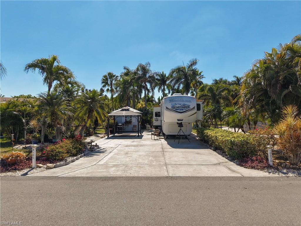 Welcome home to Lot B105 in beautiful cypress Woods RV Resort!  Sit back and relax on the rear patio and enjoy sunny Fort Myers Florida.  The accessory building is partially finished with stackable washer and dryer, air conditioning, small heater and plenty of storage.  The Town Center offers a large meeting room, stage, catering kitchen, card room, craft room with pool and hot tub.  The Welcome Center offers the resort office, card room, day spa, fitness center, laundry, and pool with hot tub.  This ownership luxury resort has many amenities, tennis, pickleball, shuffleboard, and many activities planned everyday.  Come and see what this resort has to offer including what South West Florida has to offer!!!