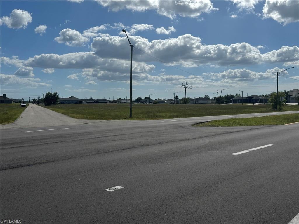 Unlock the potential of this prime corner lot located at 3030 NW 7th Place in the heart of a rapidly developing Cape Coral corridor. Spanning approximately 0.33 acres (14,250 sq. ft.), this versatile property offers a rare opportunity for both investors and visionaries. With C-zoning in place, the possibilities are vast—ranging from a custom-built residence to a strategic commercial venture such as retail, professional office space, or a service-oriented establishment.

Positioned perfectly near the intersection of Pine Island Road and US-41, this location puts you right in the center of the action. You’ll be minutes away from an array of shopping centers, diverse dining options, medical facilities, and local parks. The lot features paved road access with electricity nearby, making the initial stages of development that much smoother. Plus, sitting in Flood Zone X means you can build with confidence, as flood insurance is typically not required.

This oversized corner parcel provides excellent visibility and plenty of room to bring your architectural goals to life. Whether you are looking to plant roots in a growing neighborhood or expand your commercial portfolio, this lot represents a smart, high-potential investment in one of Florida’s most dynamic cities.