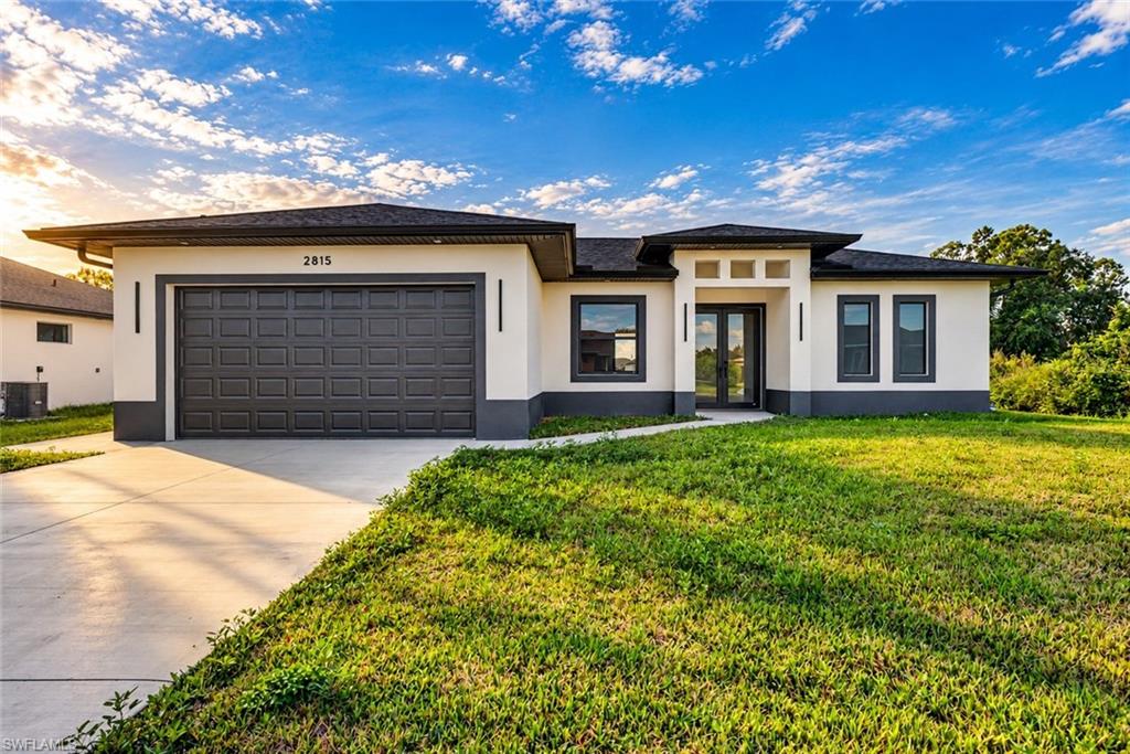 BRAND-NEW CONSTRUCTION | MODERN DESIGN | 3 BEDROOMS | 2 BATHROOMS | IMPACT WINDOWS & DOORS | SPACIOUS BACKYARD!

Discover modern Florida living in this beautifully designed new-construction home in Lehigh Acres! Offering 3 spacious bedrooms, 2 bathrooms, a 2-car garage, and 1,621 sq. ft. of living space, this home combines contemporary style, comfort, and functionality. From the moment you arrive, the modern exterior creates an impressive first impression. Step inside to an inviting open-concept floor plan designed for everyday living and entertaining, with a seamless flow between the kitchen, dining, and living areas. The primary suite offers a comfortable private retreat, while the additional bedrooms provide flexibility for family, guests, or a home office. Situated on an approximately 0.25-acre lot, the property features a spacious backyard with plenty of potential for a future pool, outdoor kitchen, or your own private Florida oasis! Additional highlights include impact-resistant windows and doors and the benefits of brand-new construction. Conveniently located near shopping, dining, schools, and major roadways connecting to Fort Myers. YOUR OPPORTUNITY TO OWN A BEAUTIFUL BRAND-NEW HOME STARTS HERE! Schedule your private showing today!