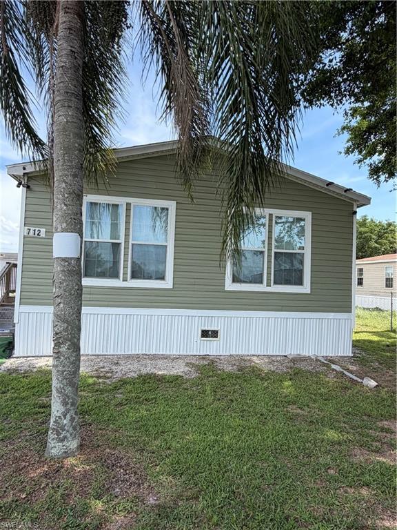 Excellent Value!! Welcome Home! Newer home! Beautiful 2023 double-wide manufactured home is ready for its new owner! Nestled on a nicely maintained, fully fenced and gated property accented by gorgeous palm trees, this hidden gem offers the perfect blend of comfort, privacy, and convenience.

Featuring 3 bedrooms, 2 bathrooms, attractive wood-look laminate flooring, and a spacious, open-concept layout, this home offers plenty of room for comfortable everyday living and entertaining. Built in 2023, the newer construction may offer buyers added advantages when obtaining financing and homeowners insurance compared to older manufactured homes.

Enjoy the privacy and security of a gated property while being conveniently located just minutes from Clewiston's schools, shopping, dining, and local amenities. Whether you're a first-time homebuyer, looking to downsize, or searching for a seasonal retreat, this property checks all the boxes.

Move-in ready and waiting for its new owner—schedule your private showing today and come see this hidden gem for yourself!