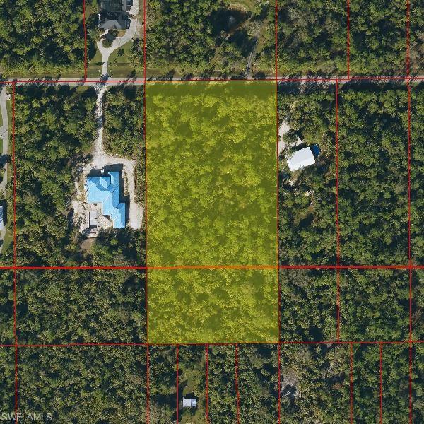This expansive vacant 5 acre lot offers the perfect setting to build your dream home with plenty of space for privacy and outdoor living. Enjoy the peace and quiet of living while being just a short drive from shopping, dining, Naples' world famous beaches. No HOA! Don't miss this rare chance to secure a large parcel of land in one of Naples fastest growing areas.