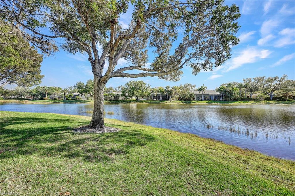 Privacy, privacy, privacy. At the end of a cul-de-sac with spectacular 180-degree lake views. This three-bedroom, two-bath in Lakemont Cove is in walking distance of multiple shopping and dining establishments. Being an end unit with a southeastern exposure, there is an abundance of light. This residence presents an excellent opportunity to personalize and enjoy life in one of Bonita Springs most desirable communities.  Pelican Landing is noted for its exceptional community amenities, private beach park, tennis, pickleball and state-of-the-art fitness center along with kayaking and sailing.
