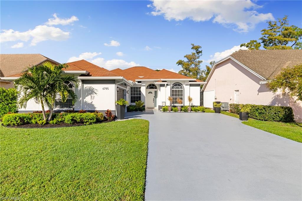 Move-In Ready Pool Home with Extensive Upgrades – All Within the Last 2 Years! Update: Brand -new A/C system installed 12/3/2025 for improved cooling efficiency and peace of mind. Step into this beautifully modernized, move-in ready pool home, thoughtfully updated inside and out for comfort, efficiency, and style. Exterior Highlights: Freshly painted driveway and garage floor. Lush new landscaping with accent lighting. Updated gutter system, outdoor spigots, and sprinkler system with timer. Paver patio and lanai with roll-down sunshade. Newly painted pool cage with brand-new screens. Resurfaced 12 x 24 saltwater pool featuring new tile, plaster, pump, skimmer, heater, and auto-fill system. Outdoor kitchen with Blackstone grill (including air fryers), new icemaker, and ceiling fan. Hookup installed for a portable generator with A/C Easy Start Flex. Lexan Hurricane Panels. Interior Highlights: Newer flooring throughout. Fully remodeled primary and guest bathrooms with upgraded plumbing and electrical. Modern baseboards and lighting fixtures throughout. Kitchen upgraded with stainless steel appliances and walk-in pantry with pool access. Washer and dryer with dedicated folding table. Water heater, smart Wi-Fi thermostat, and smoke detectors. Painted garage interior with recessed lighting, added storage, and upgraded garage door opener and spring. Comfort & Lifestyle Features: Primary suite with large walk-in closet, private sliding-door pool access, and dedicated mini-split A/C. Living area with 3-panel pocket doors opening to an expansive screened lanai, ideal for indoor-outdoor entertaining. Every detail of this home has been refreshed and upgraded for modern living and peace of mind. Whether relaxing by the newly resurfaced pool, cooking in the upgraded outdoor kitchen, or enjoying the sleek interior updates, this home is ready to welcome you in style. Nestled in the sought-after, pet-friendly Berkshire Lakes community, this home offers access to two tennis/pickleball courts, a community pool, clubhouse, walking trails, and low HOA fees. Just a five-minute drive—or a 10-minute bike ride—takes you to Publix, Walgreens, Starbucks, and dining. Naples iconic Fifth Avenue South and beautiful beaches are only 6 miles away.
