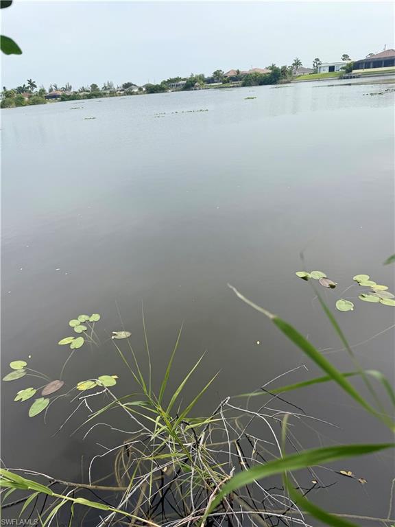 Build your Florida dream home on this affordable waterfront homesite overlooking beautiful Albatross Lake! With over 40 feet of lake frontage and a desirable northern rear exposure, this lot offers peaceful water views and the perfect setting to enjoy Florida's outdoor lifestyle. Whether you're planning your forever home, a seasonal retreat, or an investment property, this homesite provides endless possibilities. Conveniently located near shopping, dining, parks, schools, golf courses, boat ramps, and everything Cape Coral has to offer. Opportunities like this at such an attractive price are becoming harder to find. Don't miss your chance to own an affordable piece of paradise—secure this waterfront lot today before it's gone!