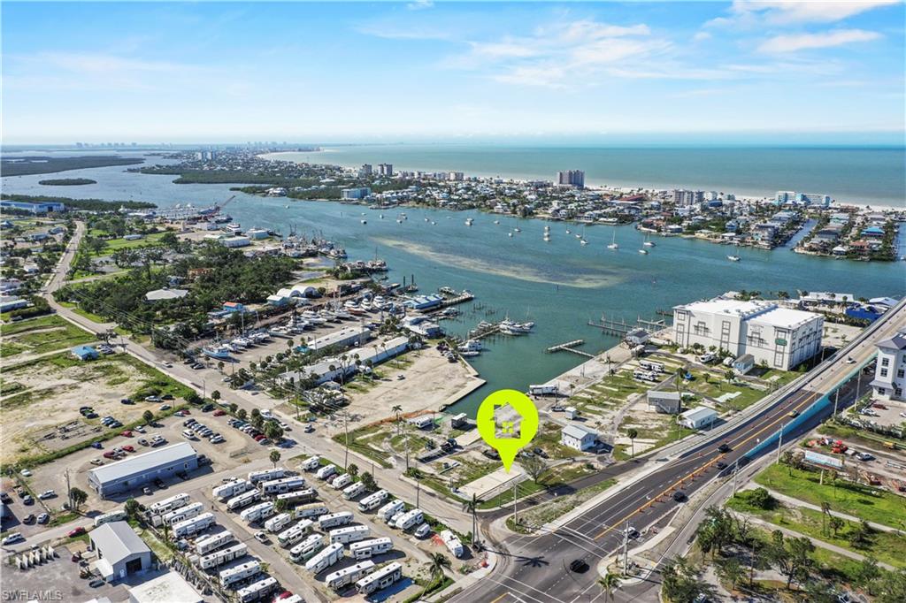 Location, location, location! Fort Myers Beach is just a walk over the bridge. This lot is located in Gulf Cove, a co-op community. This means you own 1/60th of the community. It is a 55+ waterfront community with GULF ACCESS, the Board of Directors is working on a process for the boat slip assignments. Low HOA fees, only $800/quarter! Sewer water and electric for the community has been completed, a new power pedestal and concrete pad have been installed for your convenience. Highway ready RVs allowed on the lot through October 2027. New homes must be built to FEMA standards 8-10 feet above ground. Discover your new piece of paradise today!