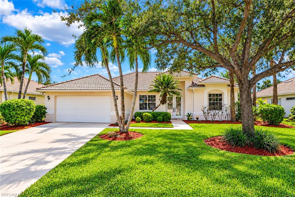 NOT IN A FLOOD ZONE! This gorgeous lakefront single family home located in Walden Lakes in Gateway Greens features; NEW a/c 2025, NEW hot water heater 2024, NEW sink & supply line in kitchen & bathrooms & low HOA dues.  This home offers an amazing layout with lake view from almost every room. Meticulously cared for single family home w/ great room design, French door front entry, formal dining area & breakfast nook, wide galley style kitchen, split bedroom floor plan, cathedral ceiling, 2-car garage, laundry room w/ folding station & utility sink, extended screened rear lanai, lush tropical landscaping, and plenty of room in the backyard for a pool if desired. Walden Lakes is situated within Gateway which is located east of I-75, close to RSW Int Airport and the Spring Training fields Boston Red Sox & MN Twins. Gateway is a community with 2 manned gates and patrolled. It is a golf & tennis community offering optional social & golf membership giving members access to pickleball, bocce ball, a fitness center, restaurant, tennis, & more.