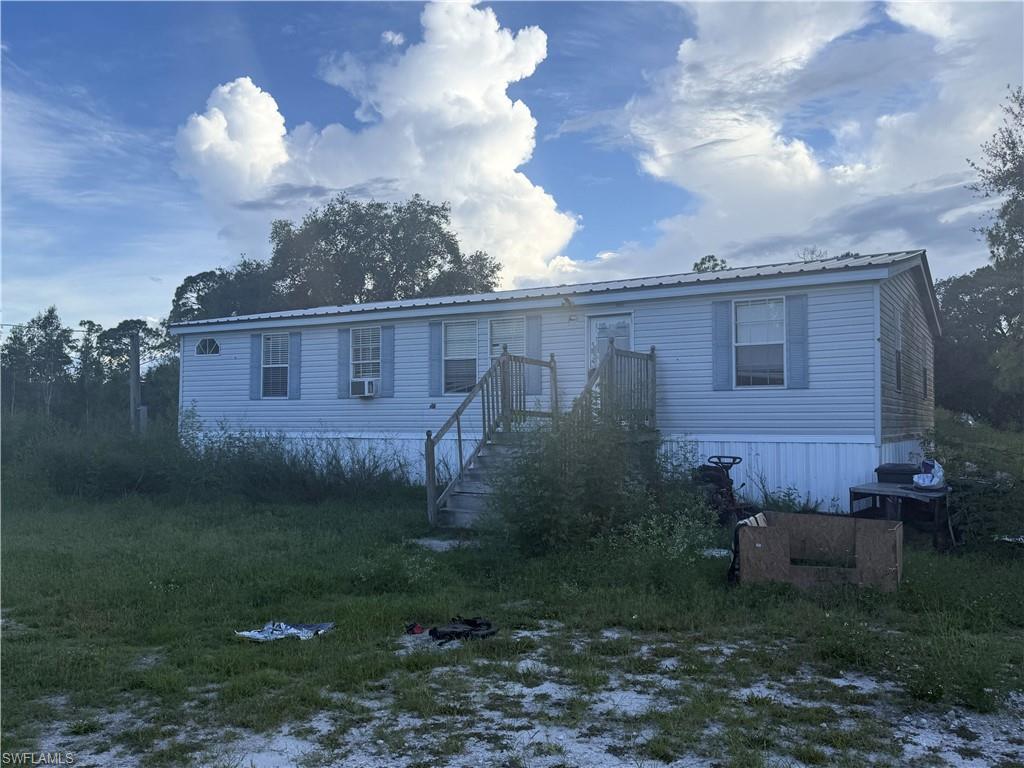 Located just off SR29 in LaBelle, this 2.39-acre property presents an opportunity for investors, builders, or cash buyers seeking a value-add project. Partially fenced with gate access. This is a CASH ONLY sale due to the condition of the property and is best suited for investors, builders, or buyers looking for their next project.