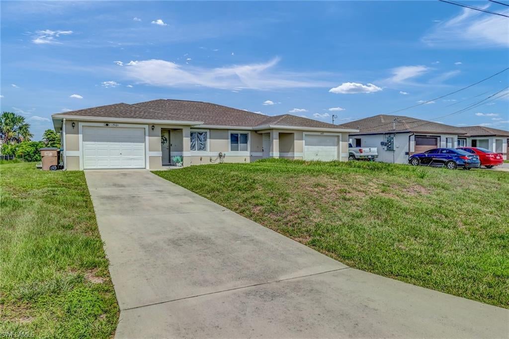 Paradise Found! Don't miss this meticulously maintained, clean, and Spacious 2-bedroom, 2-bath with office/flex, with assessments paid for peace of mind. This listing is for One Side of a duplex on a Freshwater Canal with a seawall and a boat dock. Featuring a soaring vaulted great room that opens up to a covered screened patio added in December of 2024. The kitchen includes upgraded maple cabinets, a pantry, and a breakfast bar. The home has newer paint, a washer, a dryer, and newer faucets in both bathrooms. A new roof was installed in 2023, and a new A.C. unit was installed in December 2021. You can enjoy kayaking or paddleboarding, or take your boat out onto the canals that connect to one of four lakes. The dock is shared with the occupant of the other side of the duplex. The property is split according to LEEPA.
(The other 1/2 of the duplex is also listed for sale)