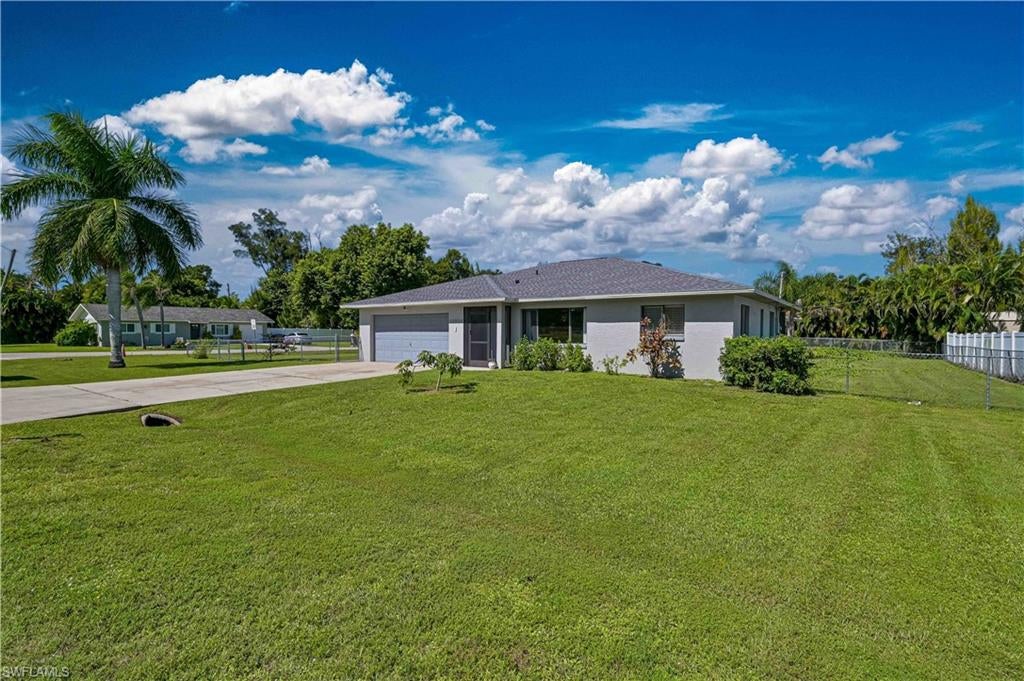 OVERSIZED FENCED CORNER LOT, CITY WATER & SEWER, NO HOA, AND MAJOR UPDATES ALREADY COMPLETED! Welcome to this charming 3-bedroom, 2-bath home offering the perfect combination of comfort, functionality, and Florida living! Enjoy peace of mind with a NEW ROOF (2024), NEW A/C (2024), WATER HEATER (2021), and freshly painted interior! Step inside to discover a spacious split-bedroom floor plan. The kitchen features beautiful granite countertops, ample cabinet space, and a pantry for additional storage. The generously sized primary suite offers a large walk-in closet and plenty of room to unwind. Step outside to your spacious screened lanai, the perfect place to enjoy your morning coffee, entertain guests, or simply relax and enjoy the Florida lifestyle! The oversized, fully fenced corner lot provides plenty of outdoor space for pets, gardening, entertaining, or creating your own backyard oasis. CITY WATER AND SEWER and NO HOA offer added convenience and freedom! Ideally situated in a convenient location close to the river, shopping, dining, and everything Southwest Florida has to offer. With major updates already completed, a fantastic lot, and a functional floor plan, this home checks all the boxes! Schedule your private showing today! please note some photos are virtually staged.