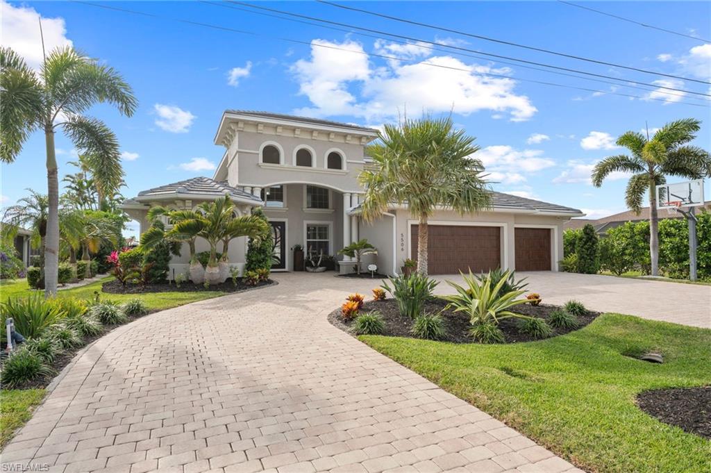 LUXURY GULF ACCESS with SWFL’s unparalleled Sunsets! This stunning saltwater POOL HOME is the perfect place to gather all your family and friends and create lasting memories. Nestled in one of Southwest Cape Coral’s most desirable locations, an elevated experience awaits as you enter inside. Spacious accommodations with nearly 3,800 interior sq. ft. plus expansive lanai, the home has 6 Bedrooms (two primary suites), 4 Bathrooms, a two-story GREAT ROOM with an additional 2nd floor family room and balcony overlooking pool and backyard canal. Featuring a new Chef’s kitchen with high quality QUARTZ countertops, stainless steel appliances, modern cabinetry and ample room for entertaining. Dedicated wine room with 200 bottle wine refrigerator. Designer-
appointed touches including newly upgraded solid core interior doors and trim throughout. All Impact Windows and Doors. Brand new A/C and air handler (2024) in primary suite. New tile roof installed in 2023. Beautiful outdoor Kitchen with TEC Infrared Grill. Oversized 3-car garage with automatic locking impact doors and wired for EV charging station. 24/7 monitored security system with remote video access. Full upgrade list available. Flood Insurance is transferable. Indulge in panoramic views from the brand-new multi-level hurricane-rated pool enclosure with picture window screens. The composite dock leads to a 17,000 lb. primary boat lift with 35 ft canopy cover and 30 AMP shore power receptacle, in addition to a 10,000 lb. auxiliary lift for jet skis or 2nd
vessel. With easy access to the Gulf, this home is a BOATER'S DREAM, whether you are setting out for a day on the water, heading to the beach, on a fishing excursion or docking at nearby waterfront dining destinations. Walking distance to Tarpon Point’s restaurants, shops and marina. Experience the best of Florida’s LUXURY waterfront living, where western exposure sunsets feel like a masterpiece. This is more than a
HOME…it is a Lifestyle!