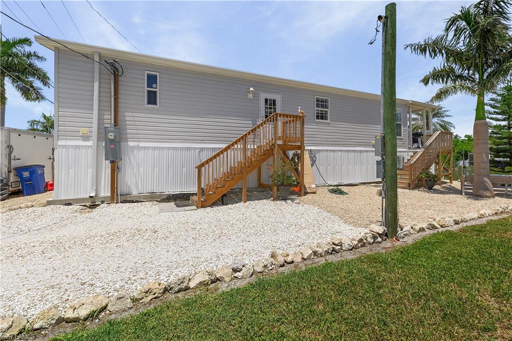Welcome to the boating and fishing paradise of St. James City! This new manufactured home sits on a direct-access canal just minutes to open water on Pine Island Sound and San Carlos Bay—with Sanibel and Captiva only a short boat ride away. A new composite dock with boat lift and low-maintenance rock/shell landscaping means more time on the water and less time on yard work.
Inside, an open-concept kitchen and living area spans the canal side of the home, capturing wide water views and beautiful natural light. Whether you’re casting off at sunrise or unwinding at sunset, this is coastal living made easy.
Don’t miss your chance to own a piece of paradise. Call today to schedule your private showing.