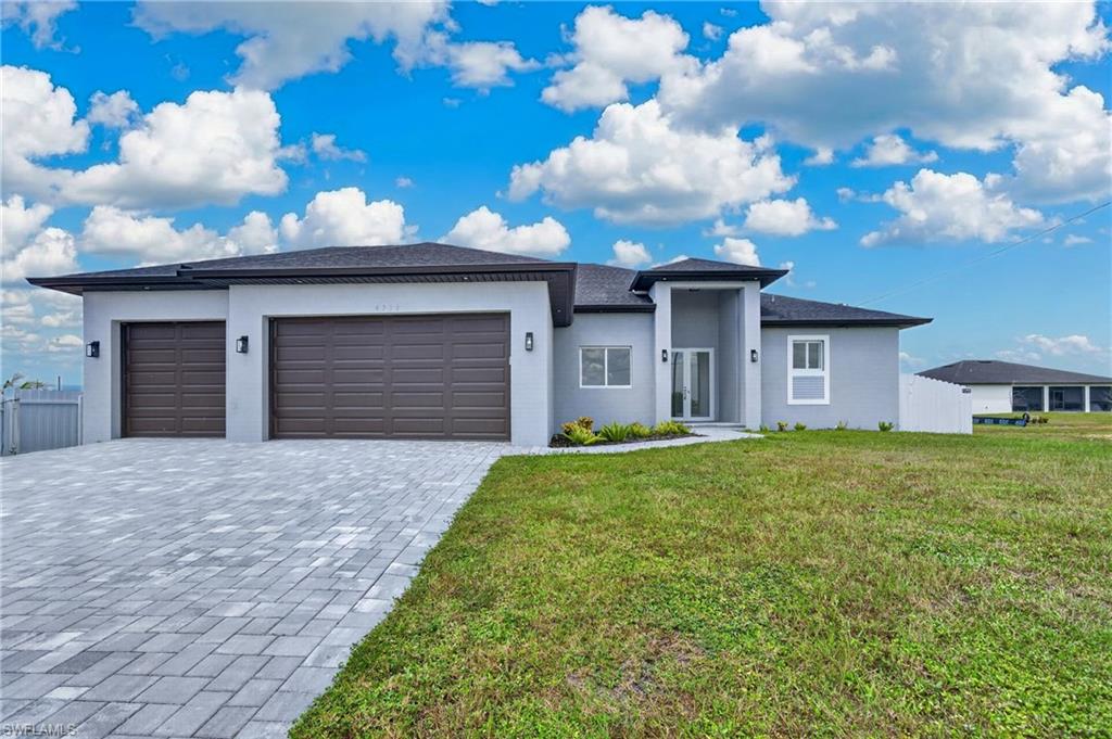 BRAND-NEW 4-BEDROOM POOL HOME | 3-CAR GARAGE | INTEGRATED SPA | FENCED YARD

Experience modern Florida living in this stunning NEW CONSTRUCTION featuring 4 BEDROOMS, 2.5 bathrooms, a 3-CAR GARAGE and approximately 1,812 sq. ft. of air-conditioned living space.

From the moment you enter through the impressive double front doors, you’ll notice the attention to detail. Tray ceilings extend throughout the home, including the bedrooms, while porcelain tile flooring, solid interior doors, modern finishes, and ceiling fans in every room create a clean, upscale feel.

The open-concept kitchen is the centerpiece of the home, featuring white cabinetry, stainless steel appliances, quartz countertops, and a large waterfall-edge island overlooking the dining and living areas—perfect for entertaining and everyday living.

Step outside and enjoy your own private Florida retreat. The POOL features a swim shelf and integrated SPA, surrounded by an attractive paver pool deck with plenty of room for lounging and entertaining. The lanai is also prepped for an outdoor kitchen, making it easy to create the ultimate indoor-outdoor entertaining space. A FENCED BACKYARD adds privacy and convenience.

Additional features include IMPACT RESISTANT WINDOWS a 3-ton A/C system, advanced septic system, upgraded water filtration system, quartz countertops in the bathrooms, and quality finishes throughout.

With new construction, four bedrooms, 2.5 baths, a 3-car garage, impact windows, fenced yard, and a resort-style pool and spa, this home checks all the boxes.

Move in and start enjoying the Southwest Florida lifestyle! Schedule your private showing today.