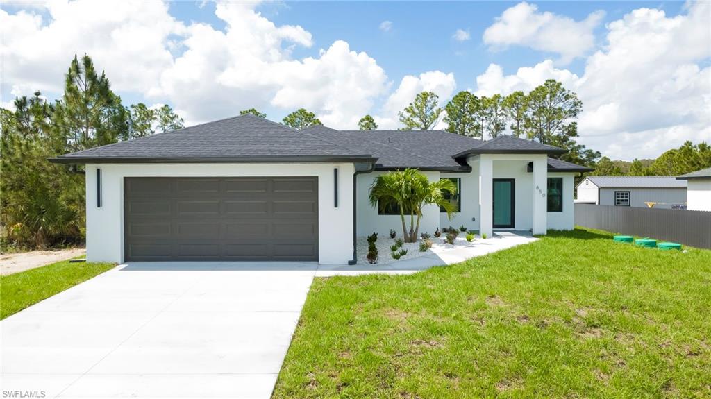 Beautiful newly constructed 3-bedroom, 2-bath home offering 1,626 sq. ft. of comfortable living space. This thoughtfully designed property features spacious rooms and a warm, functional layout—perfect for first-time buyers or growing families. Conveniently located near SR 82 and Bell Blvd in Lehigh Acres, with easy access to shopping, dining, and major roadways. Don’t miss this incredible opportunity—schedule your private showing today!