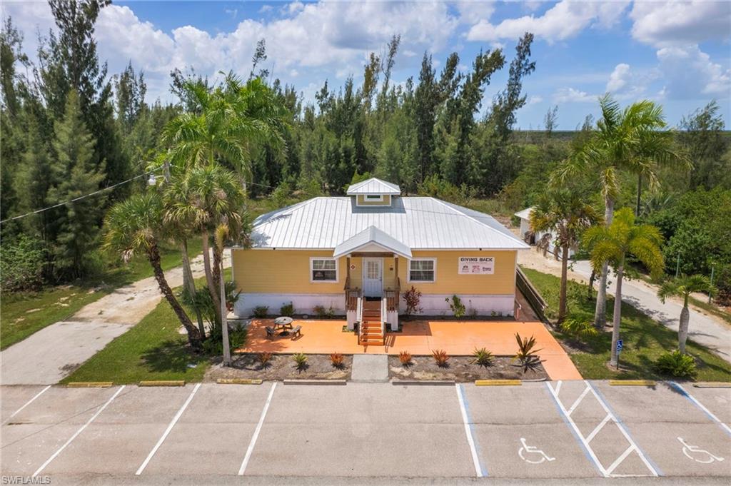 Unrivaled visibility and premium positioning define this exceptional commercial property located at 3640 SW Pine Island Road. Situated at the high-traffic gateway where Cape Coral meets Pine Island, this site guarantees maximum exposure, catching the eye of every motorist traveling onto the island. The property features a highly functional, 1,300-square-foot standalone building constructed in 2014—complete with a durable metal roof and central AC—all situated on an expansive, high-value 1.26-acre lot that provides abundant space for parking, equipment storage, or future expansion. This property is perfectly positioned for success, operating under Zoning Code 1700 and classified as Improvement Type 49 (Offices - Low Rise). With its Model Type 5 (OFFICE/MEDICAL) designation, this site is ideally suited for professional practitioners, corporate firms, or healthcare providers looking to capitalize on a high-demand corridor. Whether for sale or lease, this turnkey space offers a versatile, professional canvas in one of the area's most strategic locations.