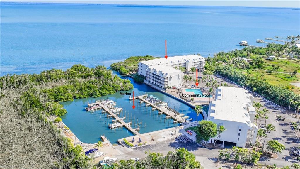 Just renovated Bayside Villa located in the gated private South Seas Resort. New kitchen and bathrooms to include granite countertops, shaker cabinets, new flooring, gorgeous walk-in shower all set in a soothing sea salt palette. Wake up to sunrise over Pine Island Sound. The Bayside amenities include an oversized sun-drenched pool and spa, under building parking, on site laundry, pool baths, marina side grills and picnic areas. No rental commitments so all options open. Move in and enjoy or place your property in a rental program. Just footsteps to the beach for a dip in the Gulf of Mexico. Easy access to village of Captiva's shops, restaurants, boating and water sports. Enjoy South Seas world class amenities with membership. Immerse yourself in the luxury of this stunning property. This exclusive opportunity enhances your living experience, offering a range of premium amenities and services tailored for members and guests. With this exceptional membership, enjoy unparalleled access to facilities that elevate your lifestyle.